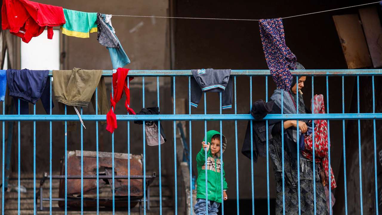 Palestinians prepare to flee Rafah after Israeli forces launched a ground and air operation in the eastern part of the city