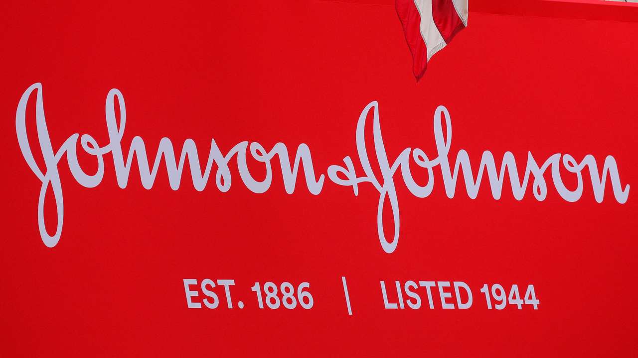 FILE PHOTO: The company logo for Johnson & Johnson is displayed to celebrate the 75th anniversary of the company's listing at the NYSE in New York