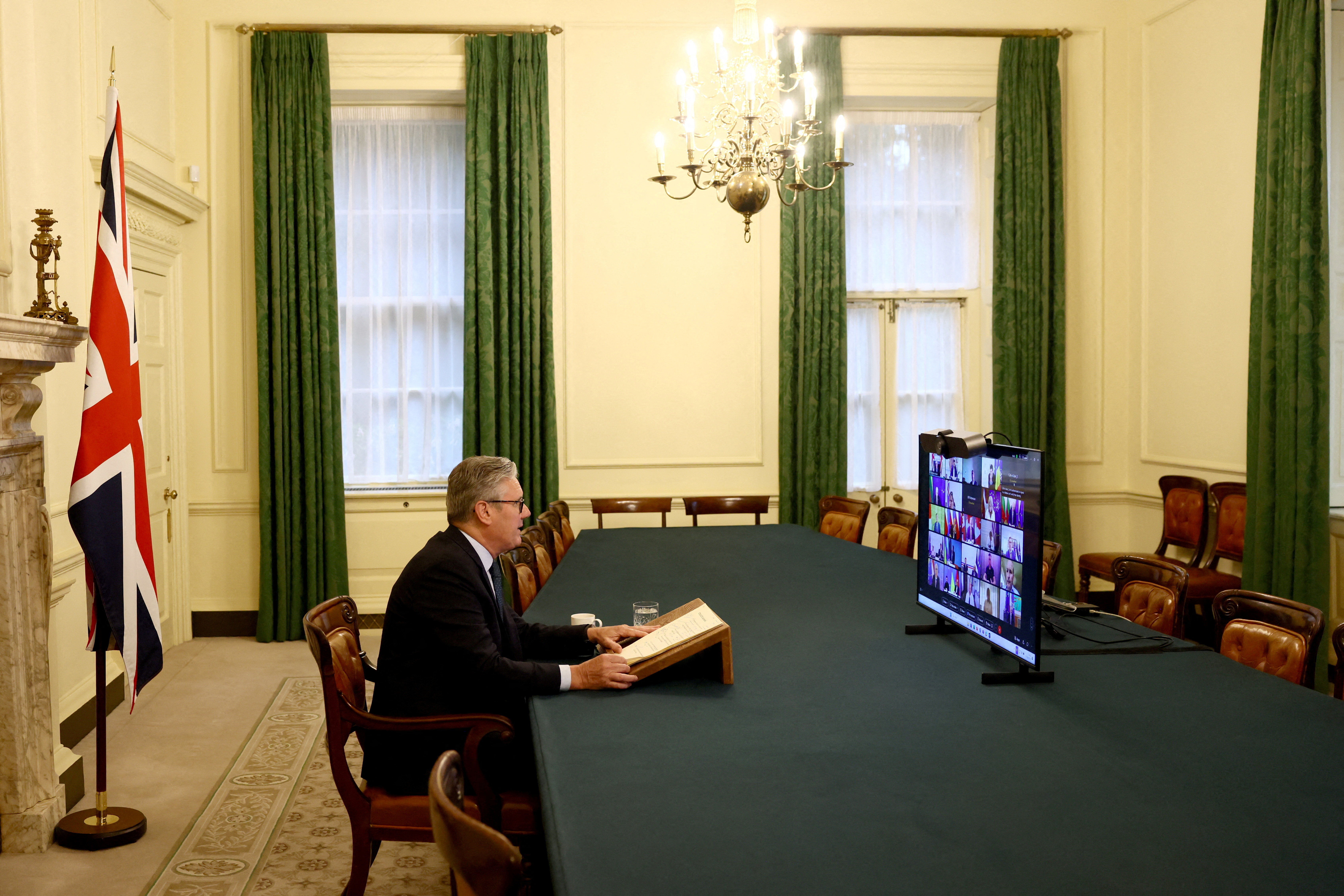 Britain's PM Starmer co-chairs the Coalition of the Willing videoconference call with European leaders on Ukraine, in London
