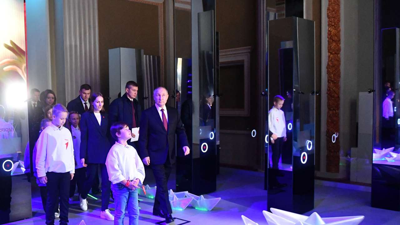 Russian President Putin visits an exhibition in Moscow