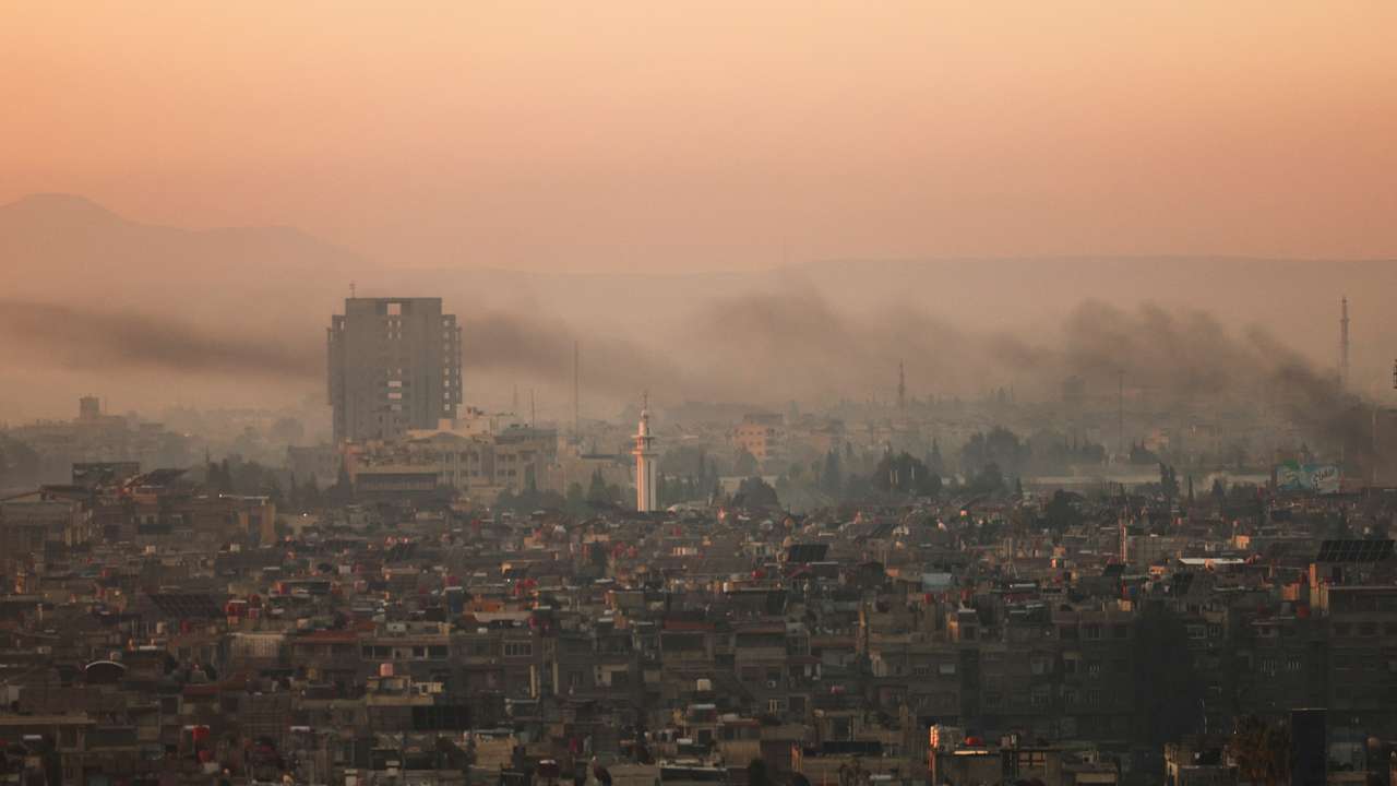 FILE PHOTO: A general view of the city during the year's first sunrise on New Year's Day, in Damascus