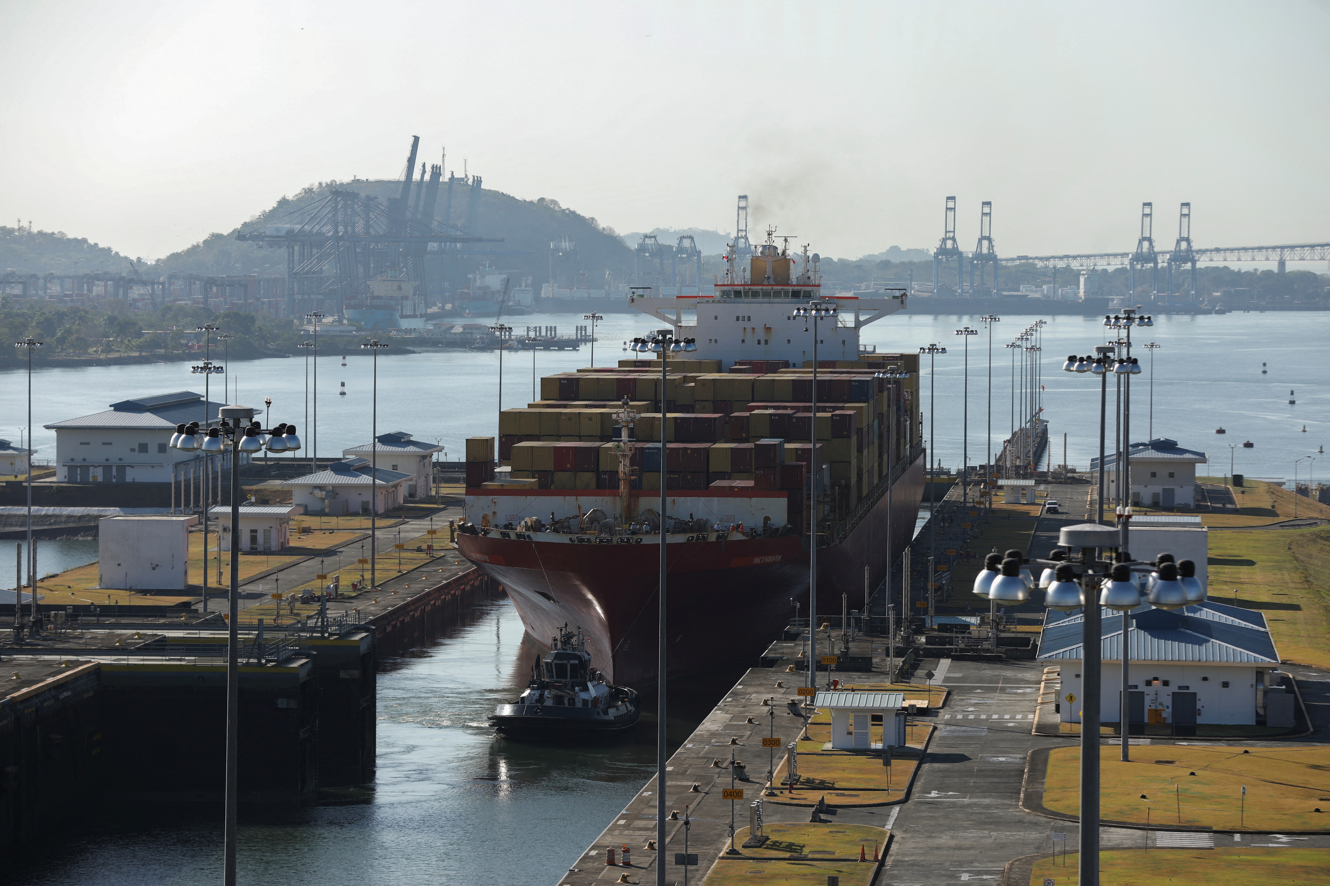 Cargo vessels transit through the Panama Canal, on the outskirts of Panama City