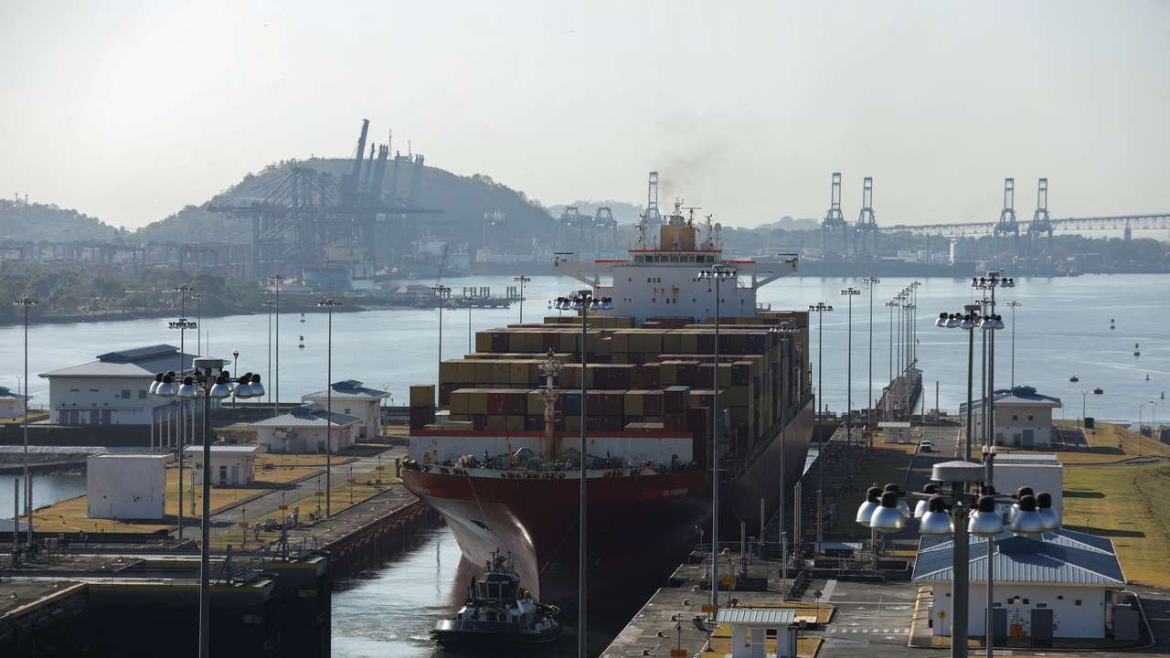 Cargo vessels transit through the Panama Canal, on the outskirts of Panama City