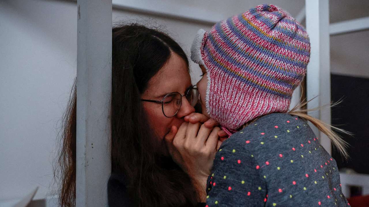 An eight-months pregnant Ukrainian mother deals with long-lasting power cuts after critical civil infrastructure was hit by recent Russian missile and drone strikes, in Kyiv