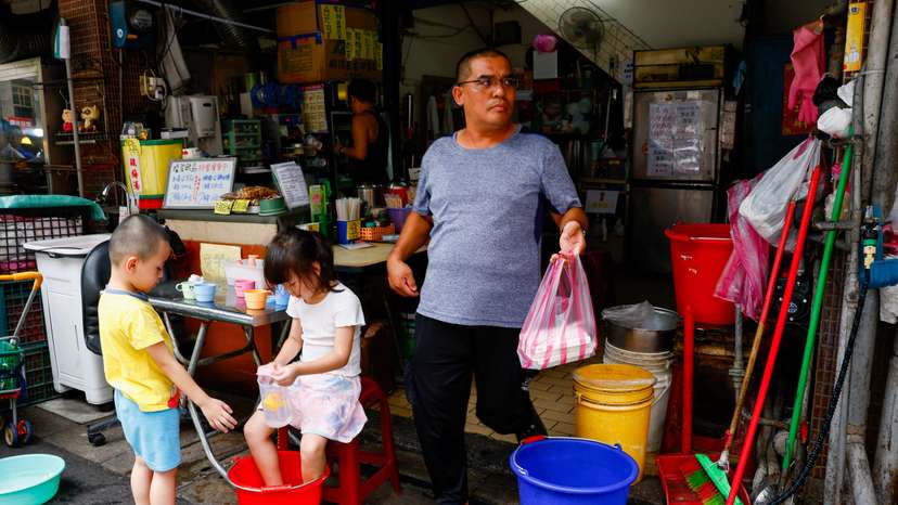 People buy lunch as typhoon Gaemi is expected to make landfall on Wednesday night in Taipei