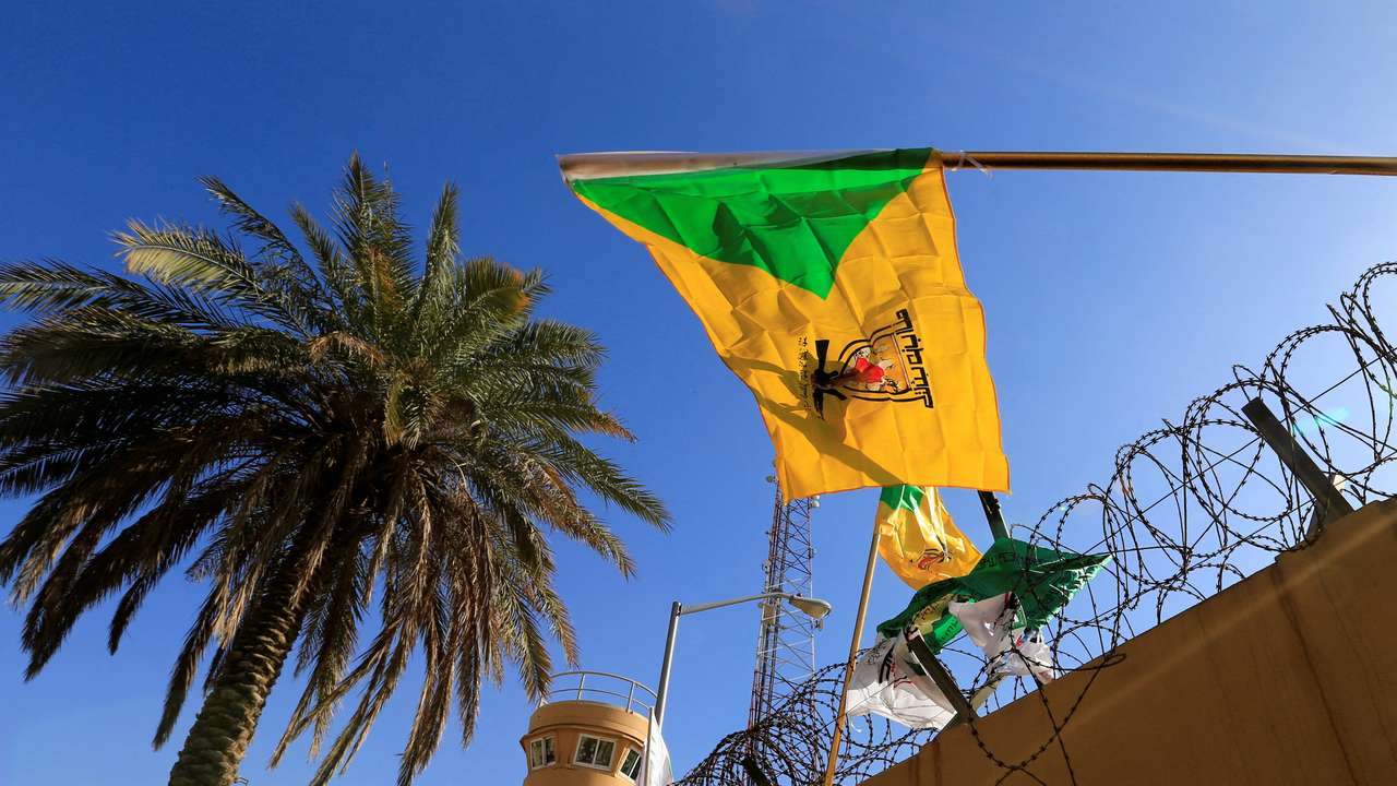 FILE PHOTO: Kataib Hezbollah militia group's flag