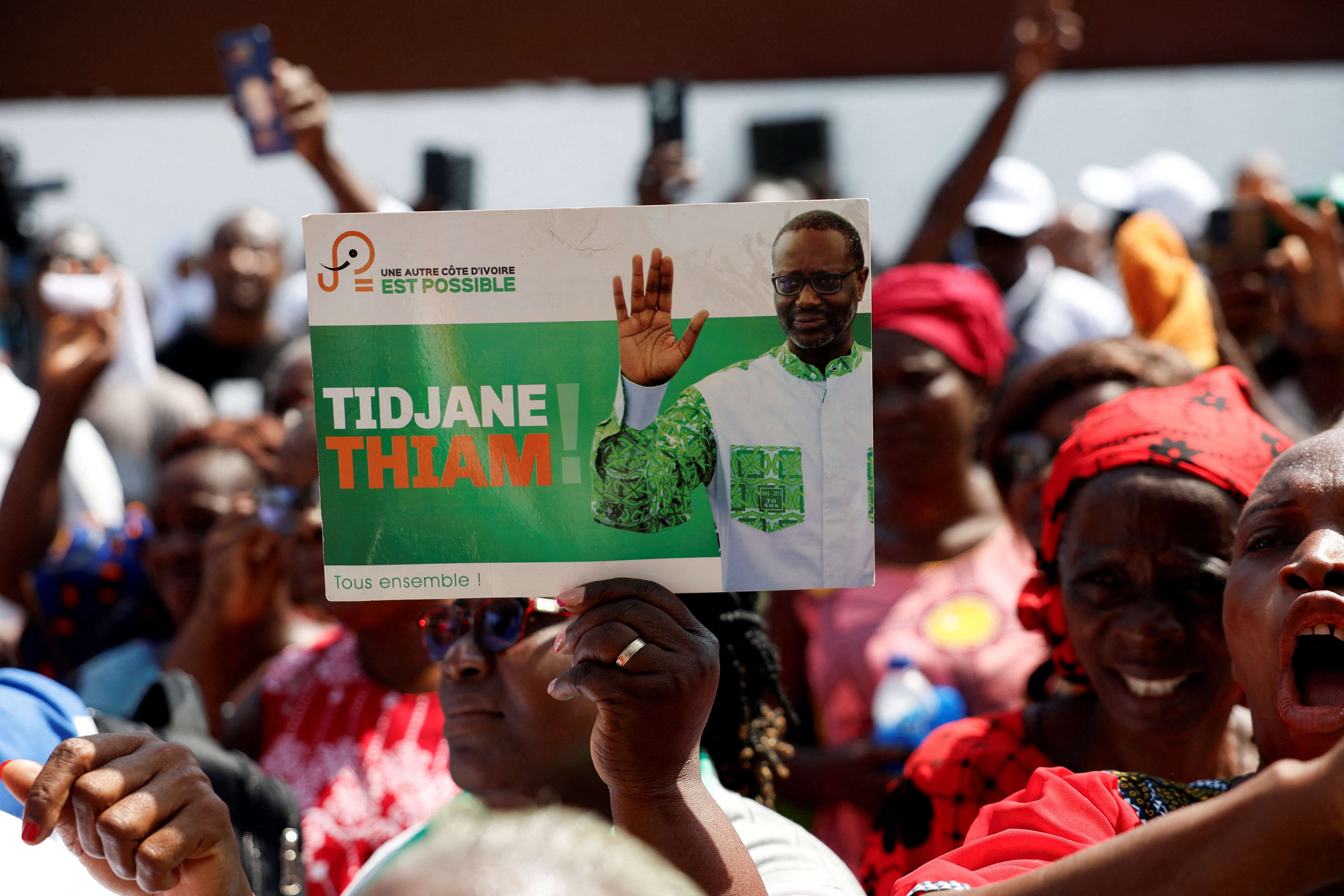 FILE PHOTO: Partisans of PDCI (Democratic Party of Cote d'Ivoire) protest at their headquarters in Abidjan