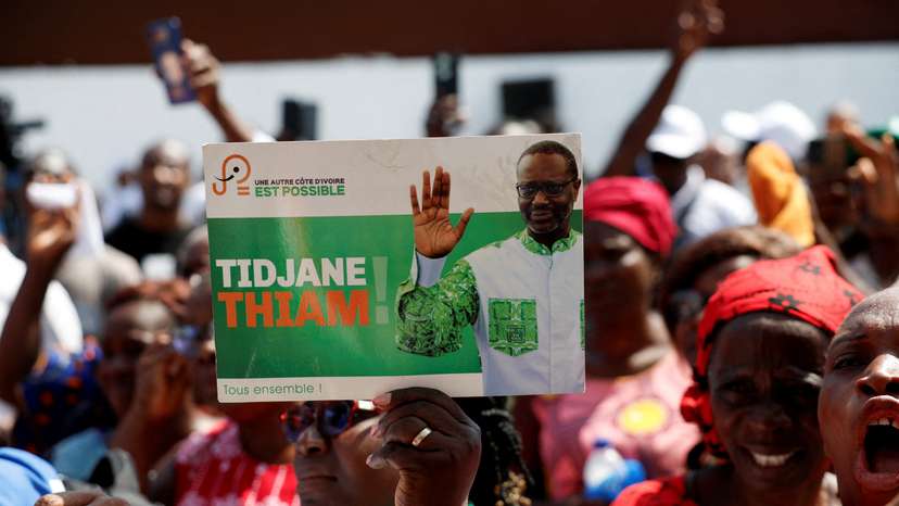 FILE PHOTO: Partisans of PDCI (Democratic Party of Cote d'Ivoire) protest at their headquarters in Abidjan