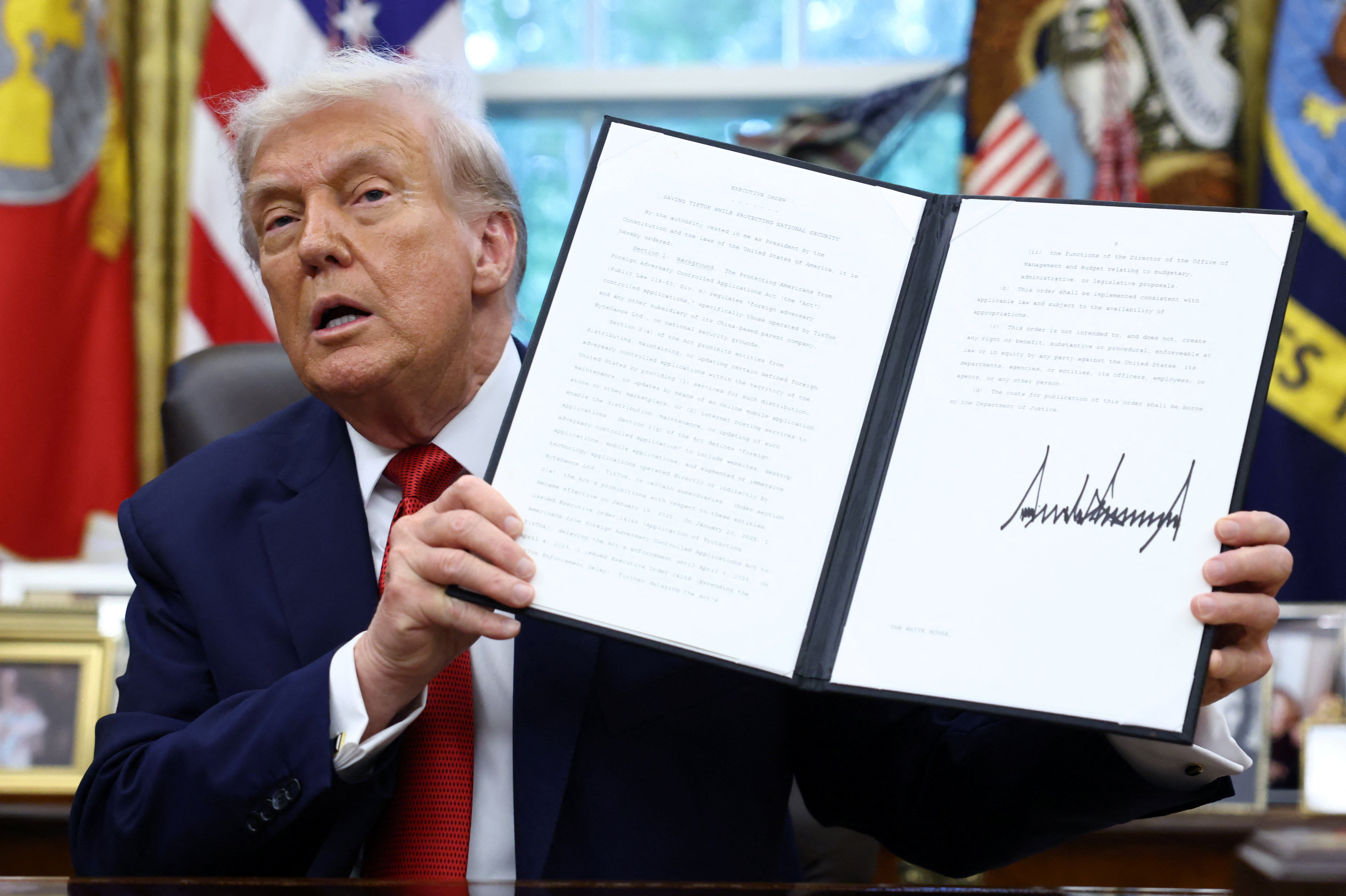 U.S. President Donald Trump signs executives orders at the White House in Washington, D.C.