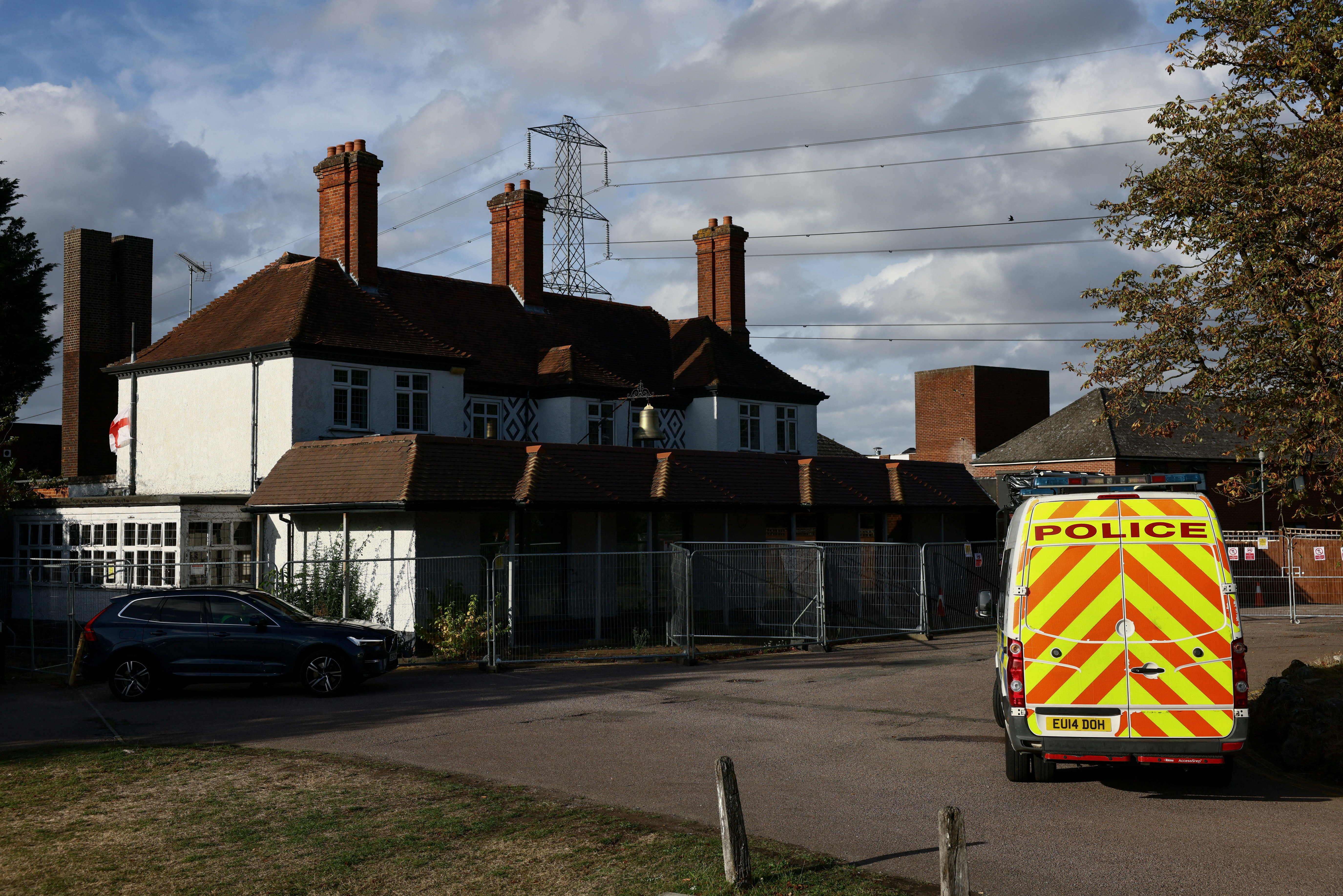 Protesters attend an anti-immigration demonstration outside The Bell Hotel, in Epping