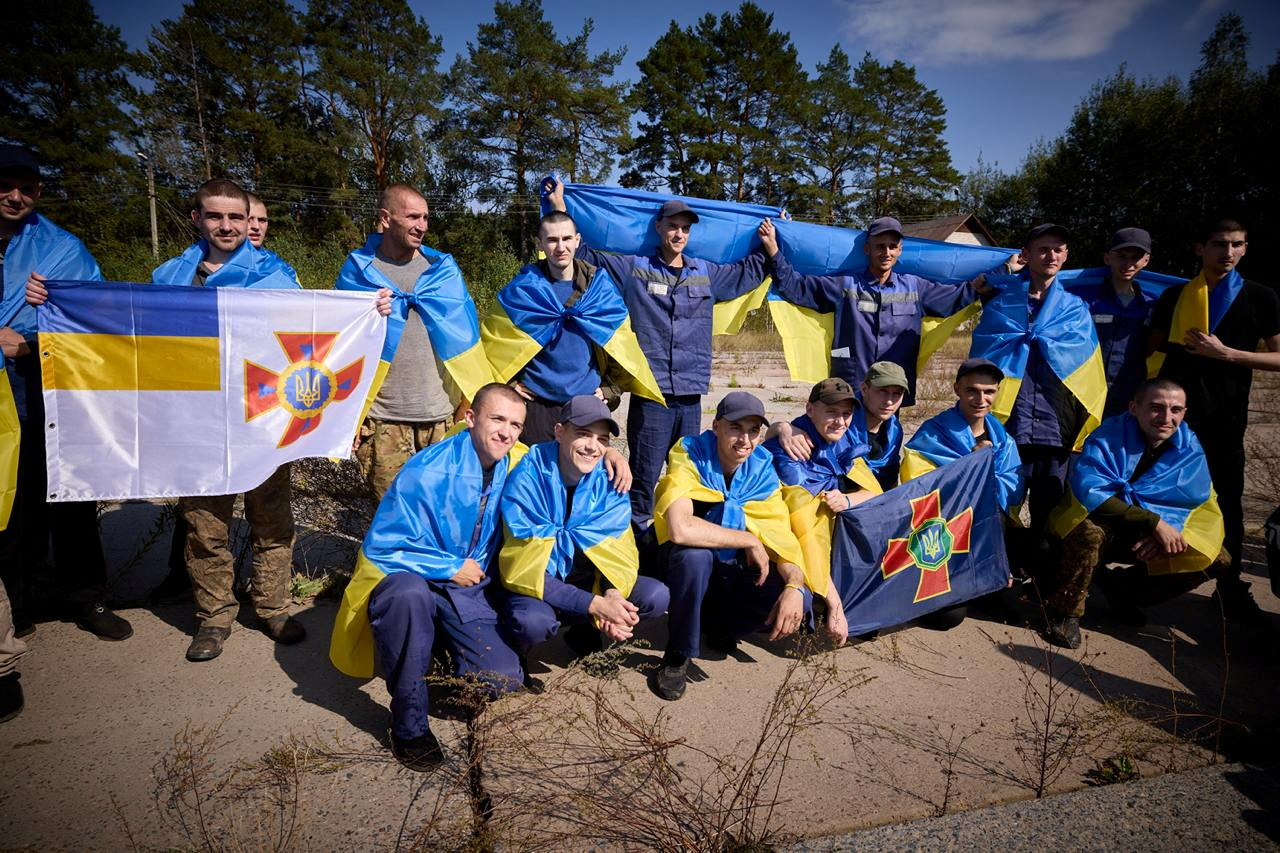 Ukrainian POWs are seen after a swap at an unknown location in Ukraine