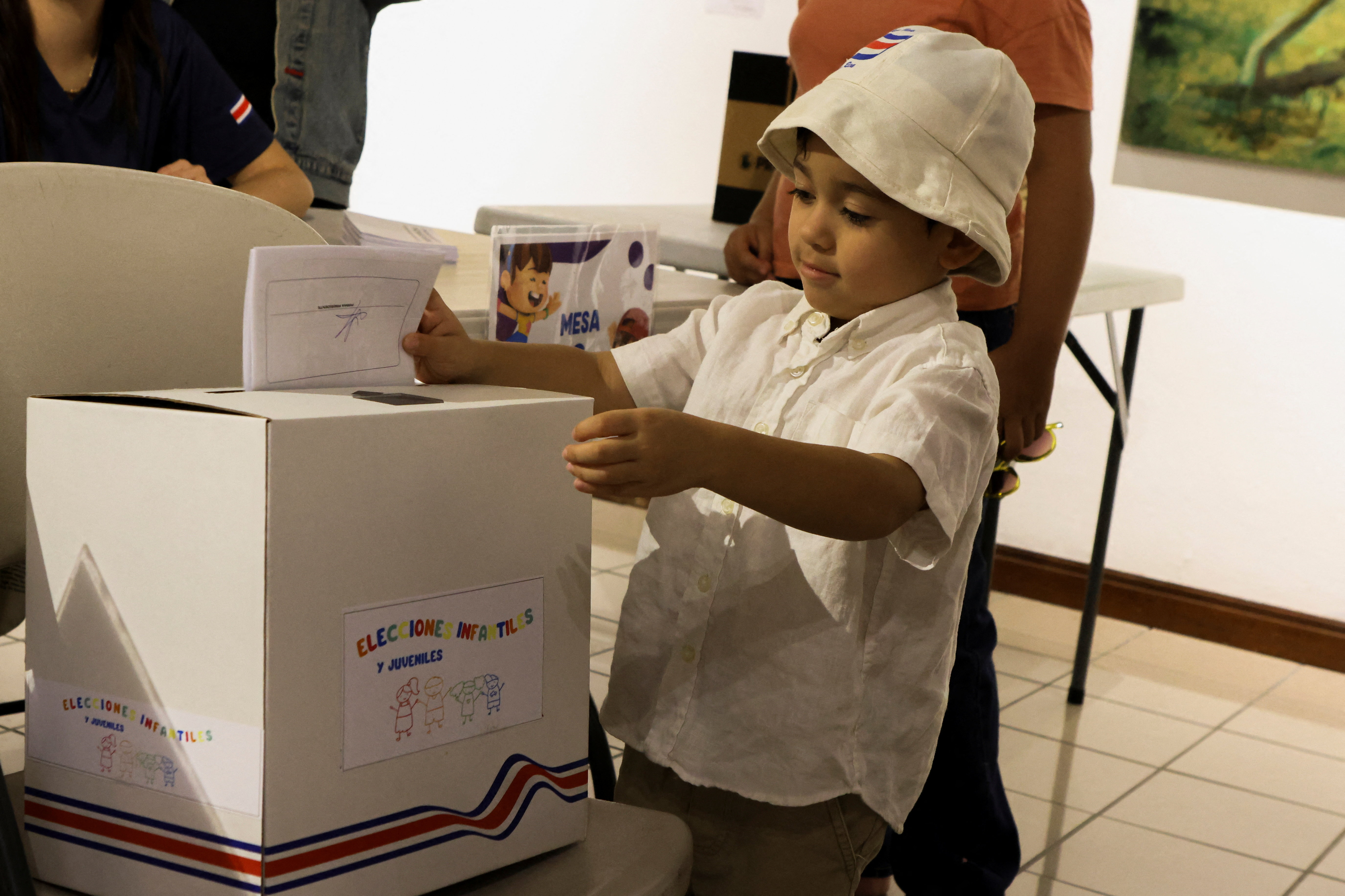 Children take part in a symbolic election at the Children's Museum during Costa Rica's general election day in San Jose
