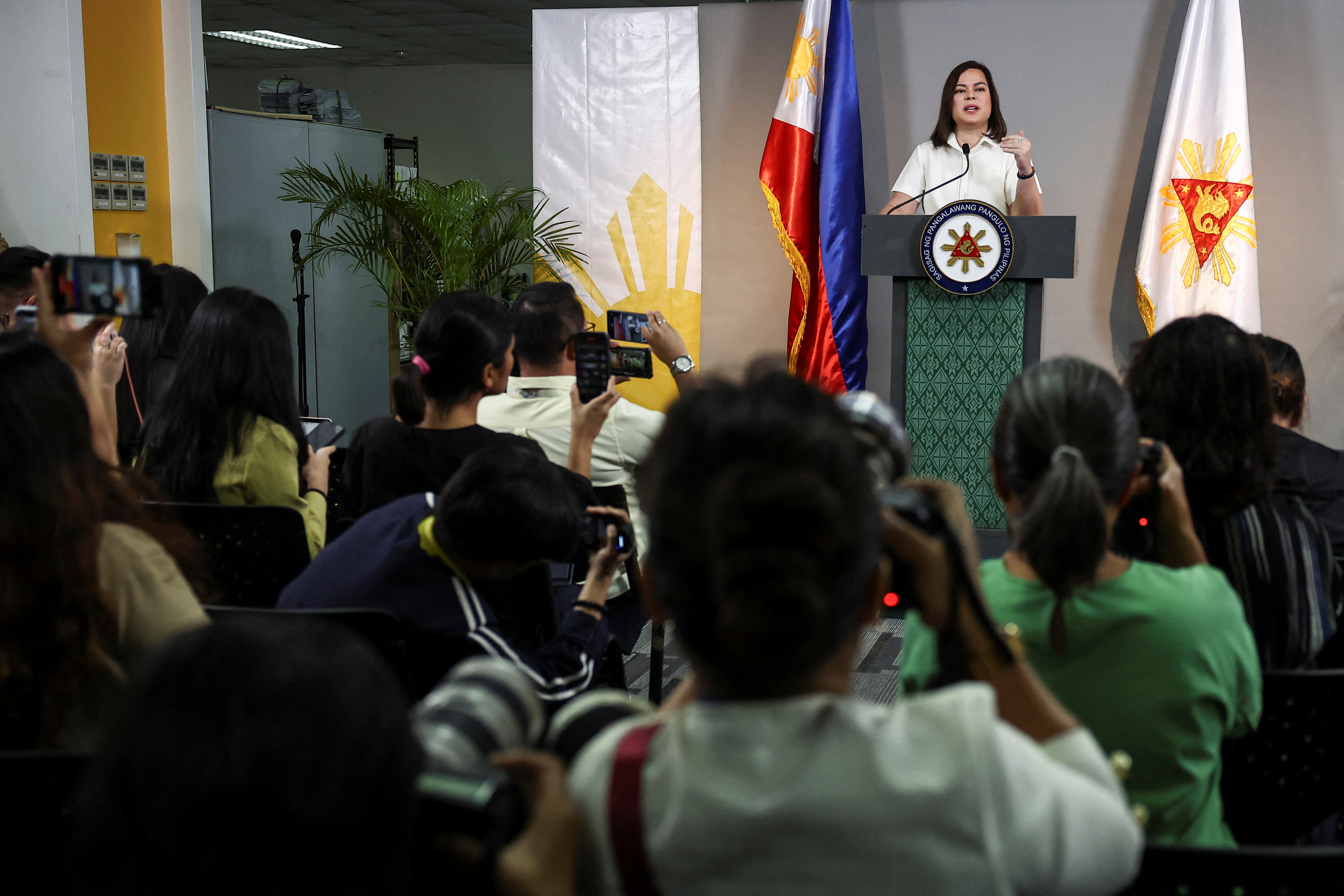 Philippine Vice President Sara Duterte delivers a statement following her impeachment by the lower house of the Congress