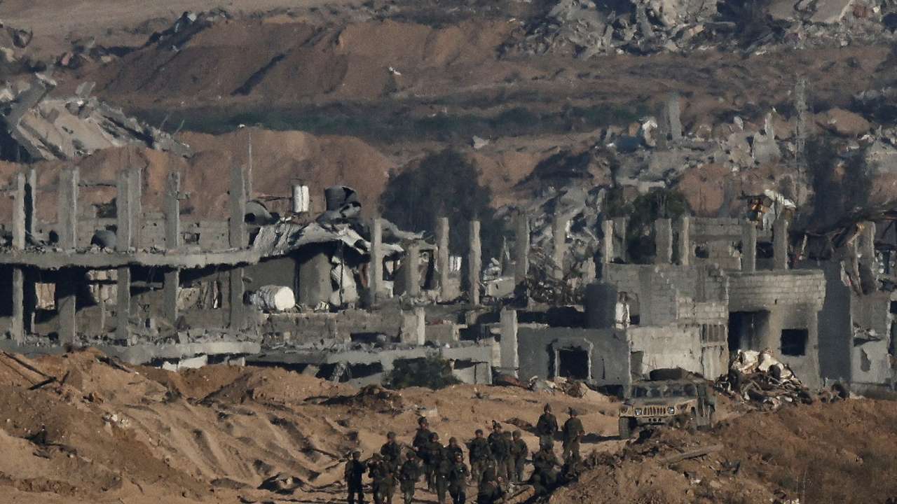 Israeli soldiers operate in Gaza, as seen from Israel