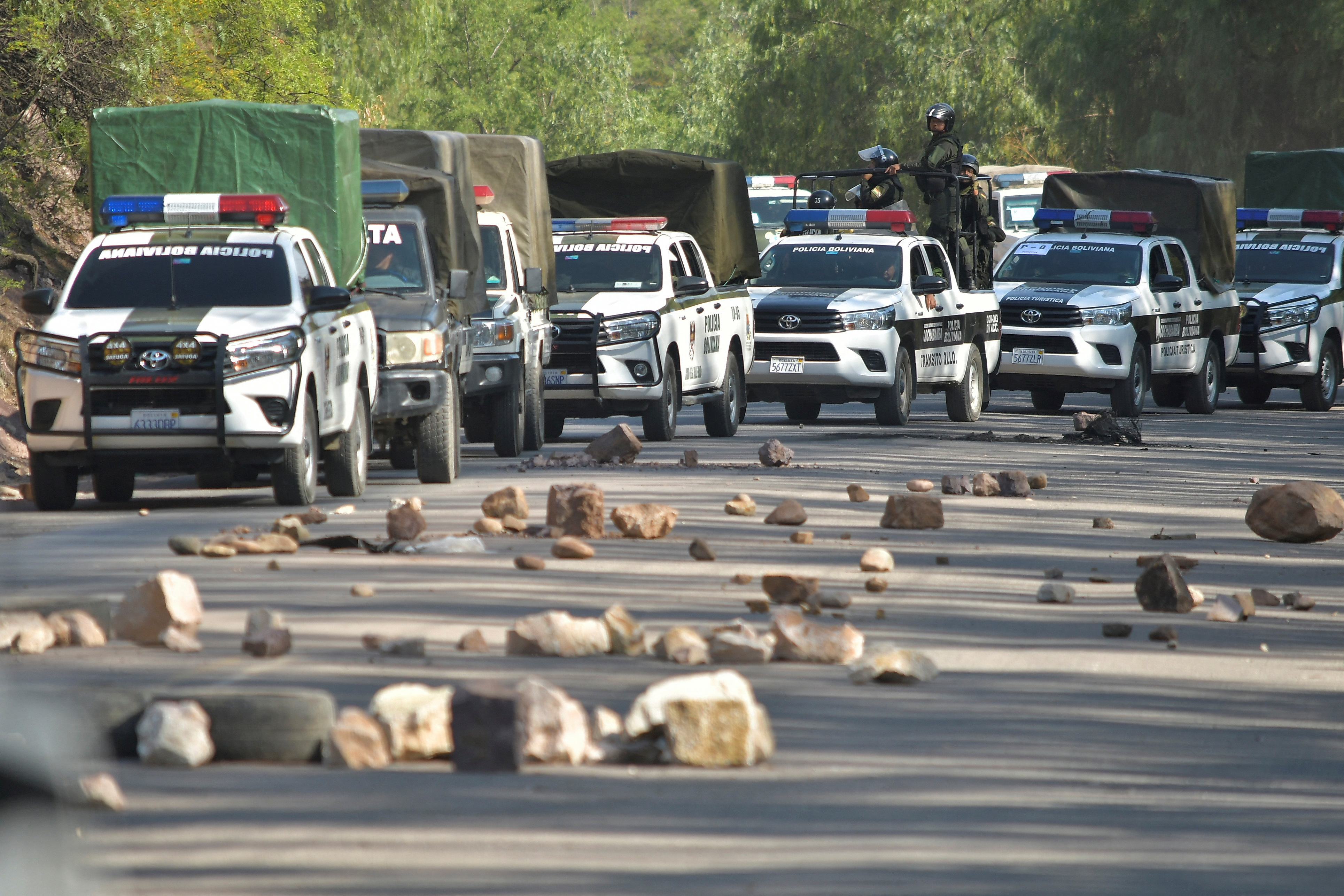 Police attempt to dismantle blockade set by supporters of Bolivia’s former President Morales, outside of Cochabamba