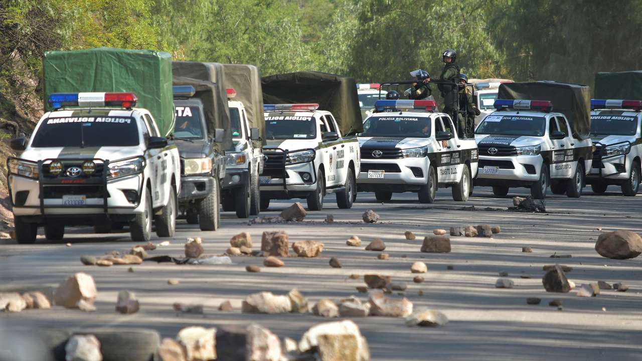 Police attempt to dismantle blockade set by supporters of Bolivia’s former President Morales, outside of Cochabamba