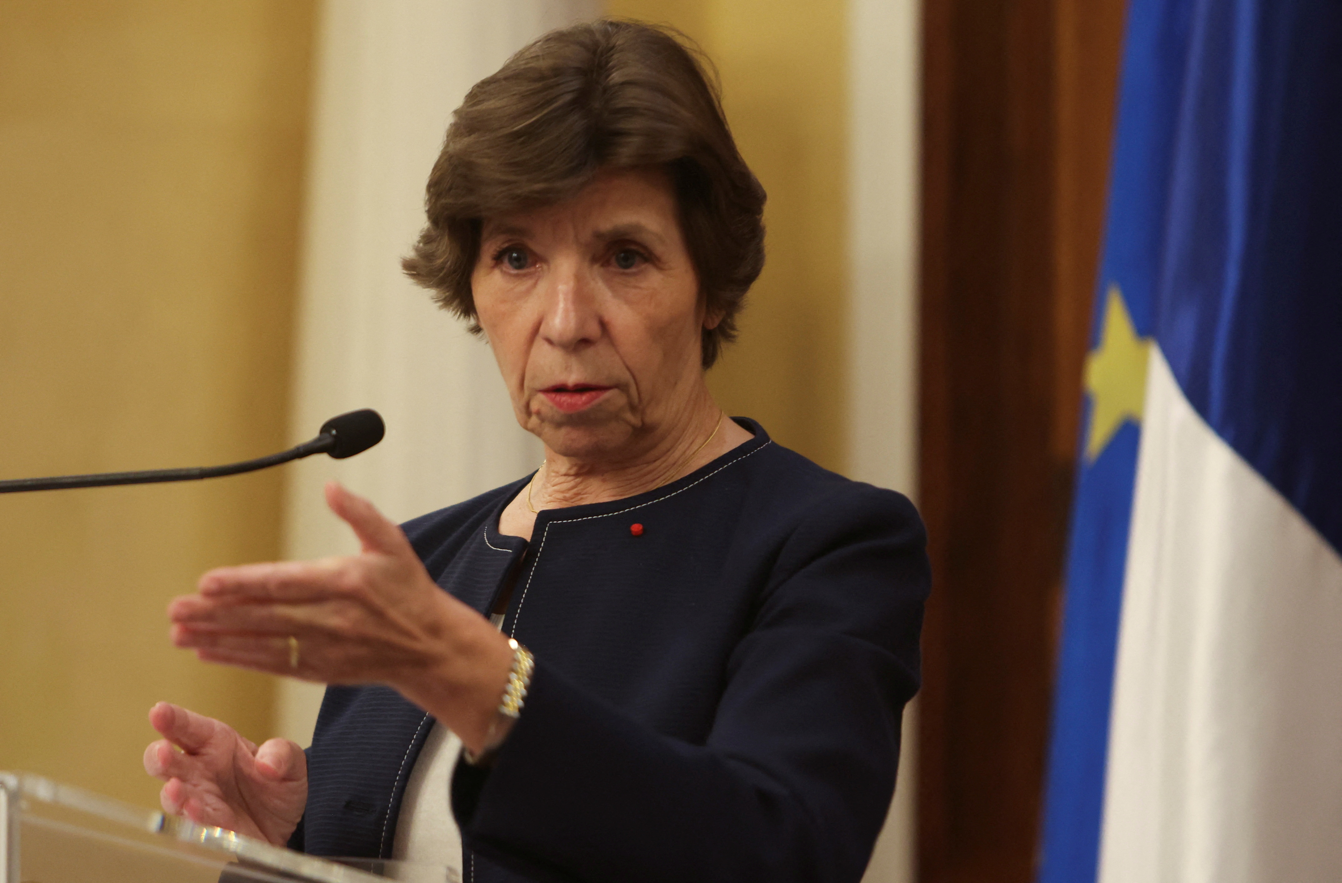 French Foreign Minister Catherine Colonna gestures as she speaks during a press conference at the Pine Residence in Beirut