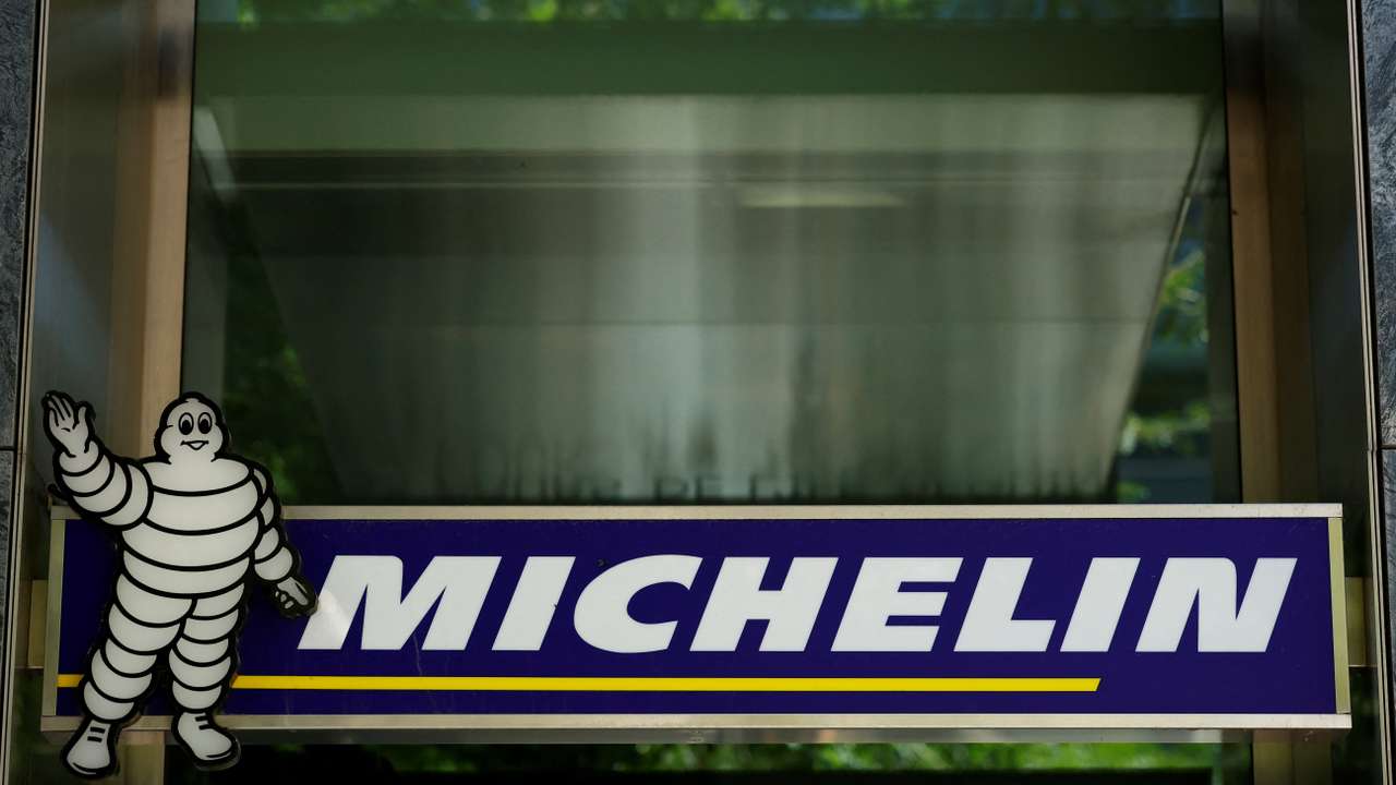 The logo of French tyre maker Michelin is seen at a company building near Paris