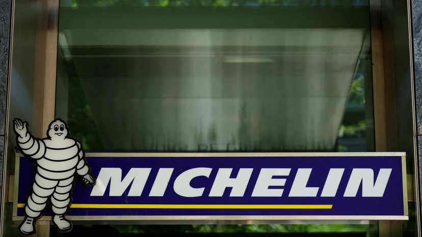 The logo of French tyre maker Michelin is seen at a company building near Paris