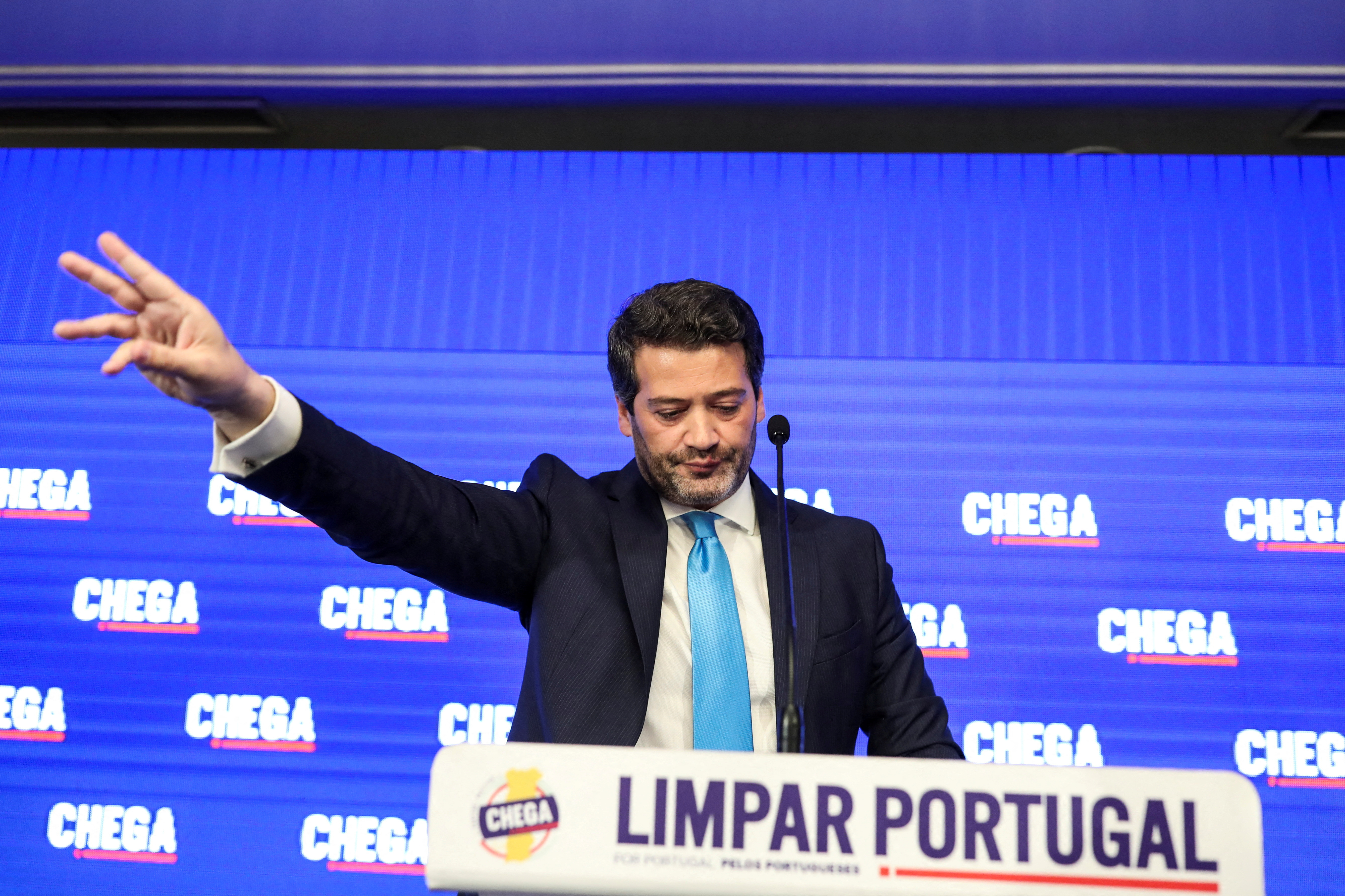 FILE PHOTO: Andre Ventura, leader of the far right political party Chega, reacts following the results from a general election