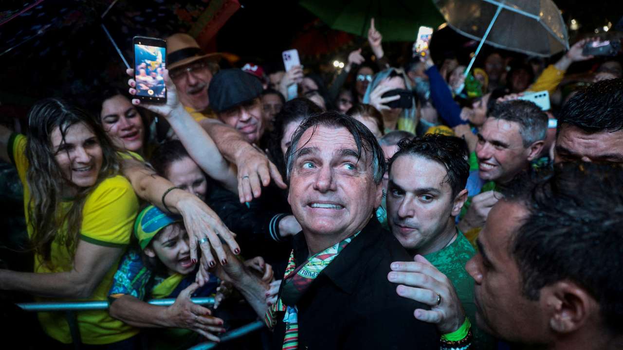 FILE PHOTO: Former Brazilian President Jair Bolsonaro meets with supporters in Porto Alegre