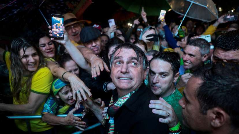FILE PHOTO: Former Brazilian President Jair Bolsonaro meets with supporters in Porto Alegre
