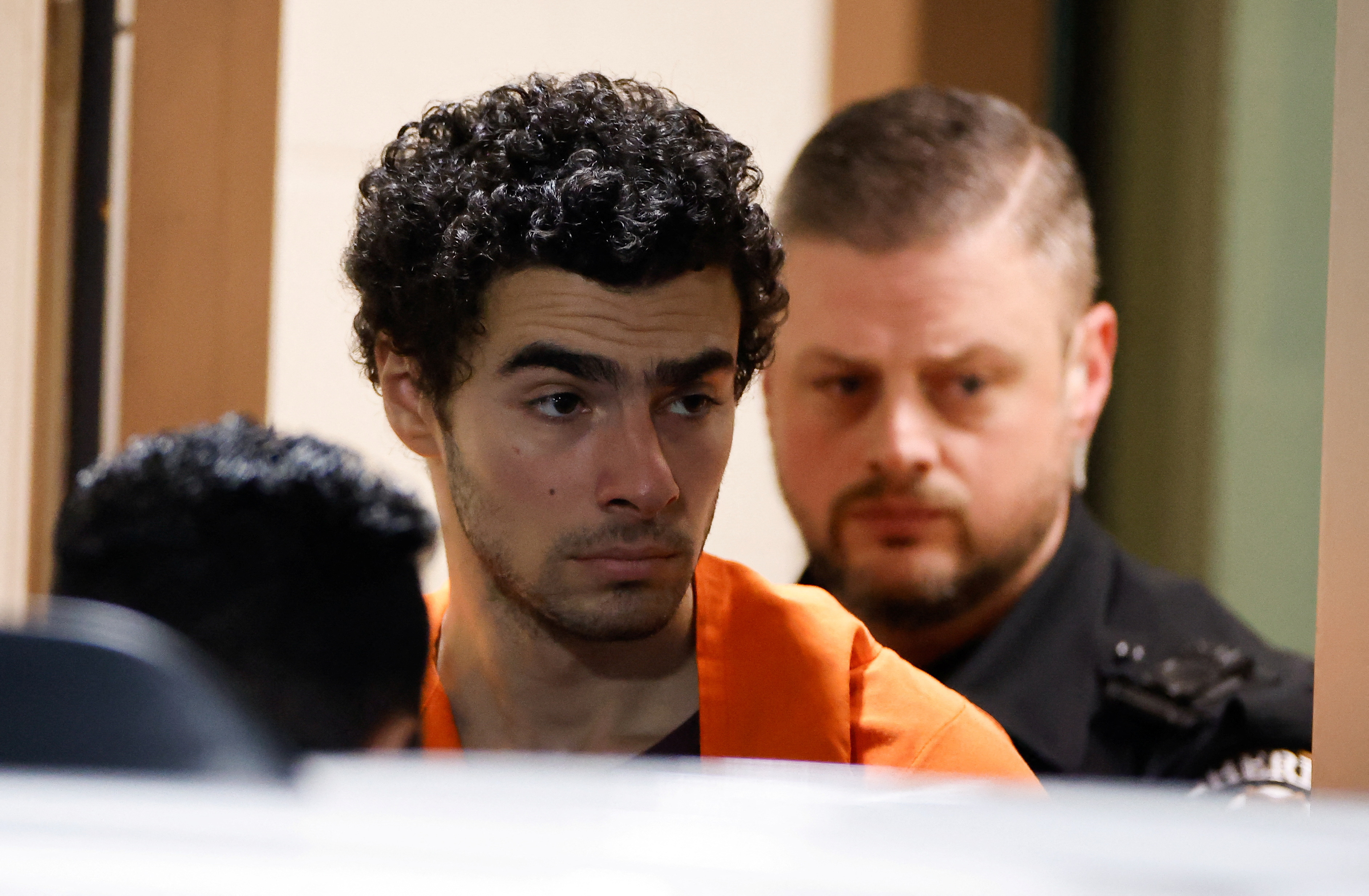FILE PHOTO: Luigi Mangione attends an extradition hearing at Blair County Court House in Hollidaysburg, Pennsylvania