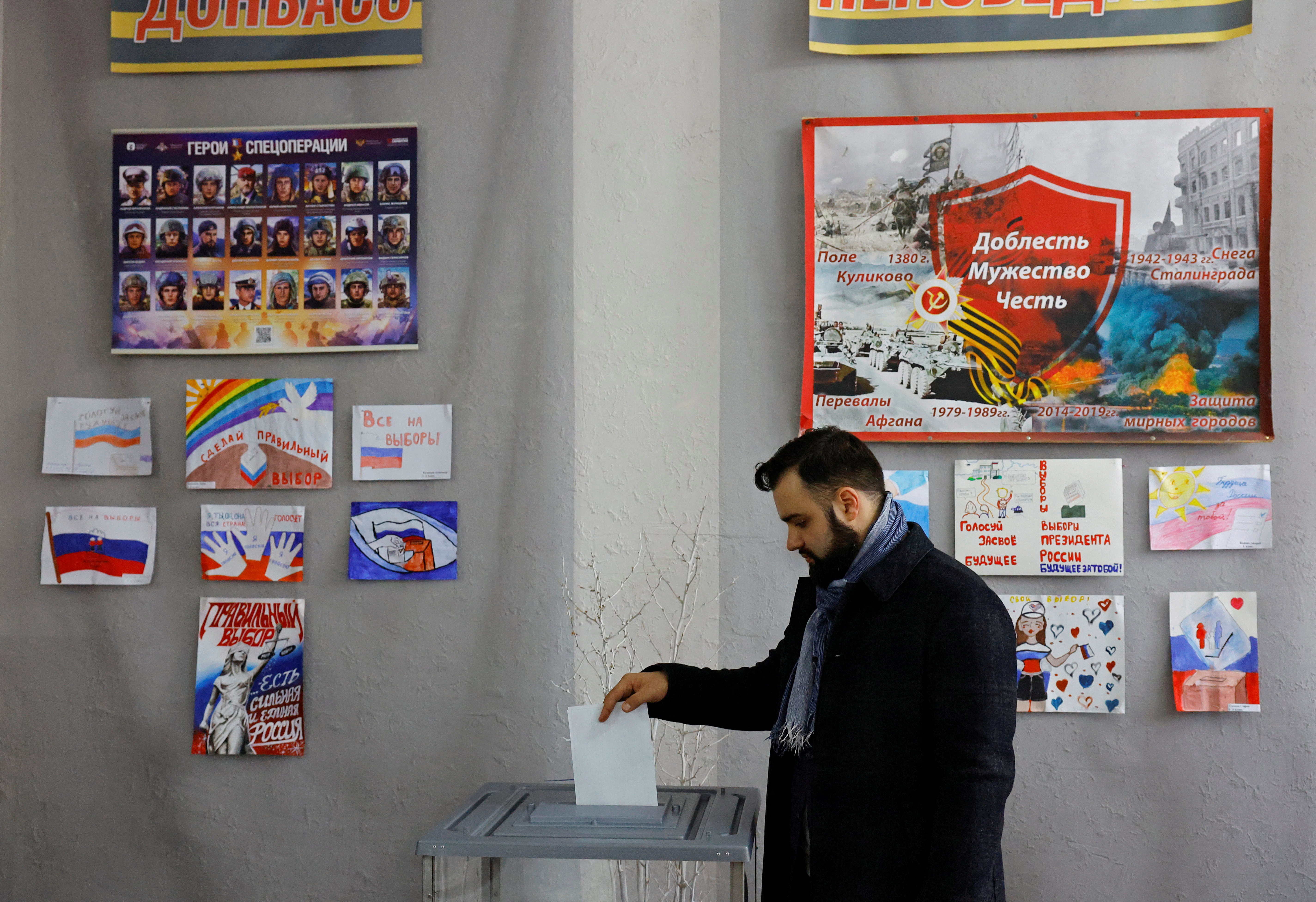 People vote in Russia's presidential election in Donetsk