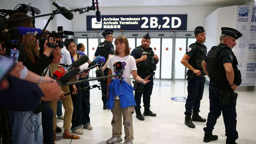 Swedish activist Greta Thunberg arrives at Paris airport