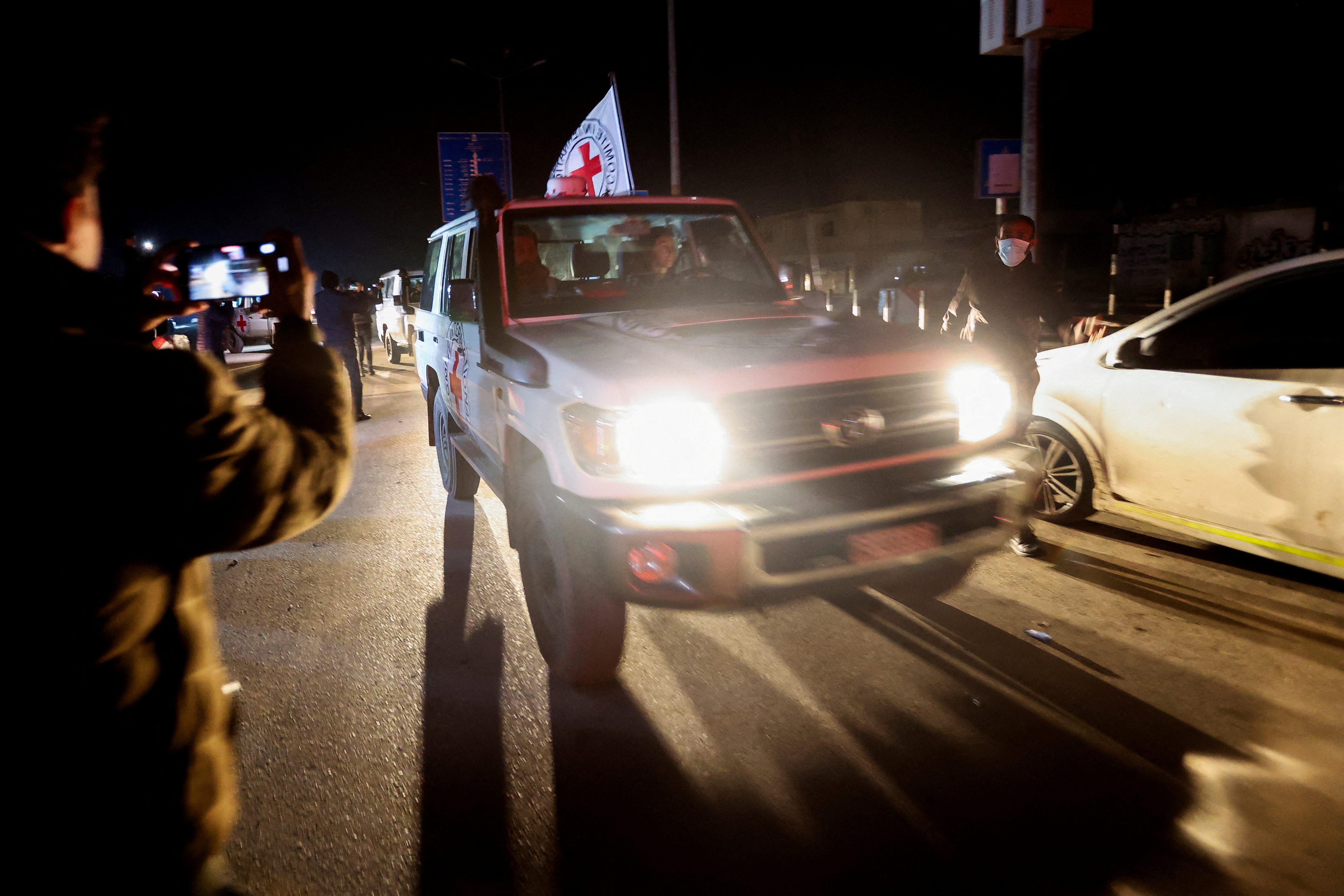 FILE PHOTO: Hostages are released as part of a deal between Israel and Palestinian Islamist group Hamas