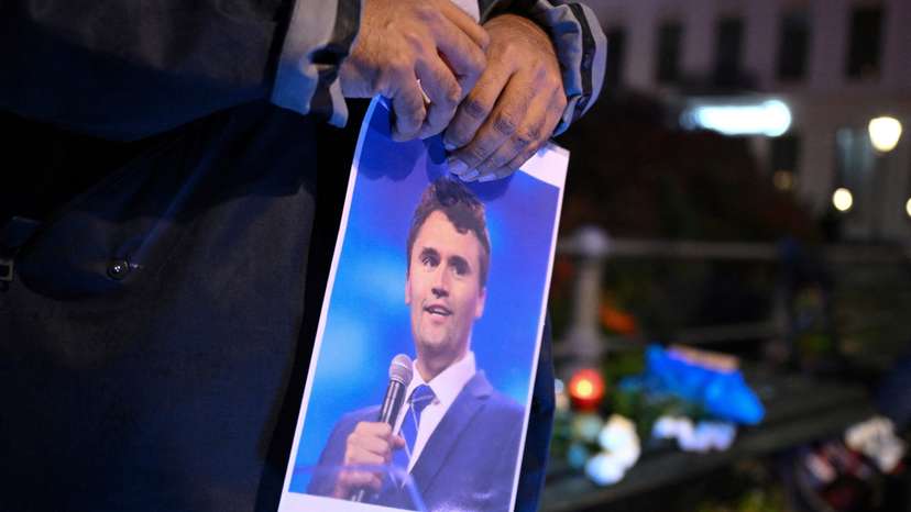 People gather to commemorate of Charlie Kirk in front of the Embassy of the United States in Berlin