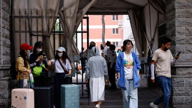 An interview with a Chinese postgraduate student who is waiting to resume visa process to study a PhD in the U.S., in Beijing