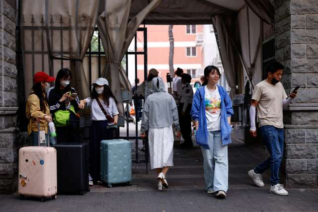 An interview with a Chinese postgraduate student who is waiting to resume visa process to study a PhD in the U.S., in Beijing