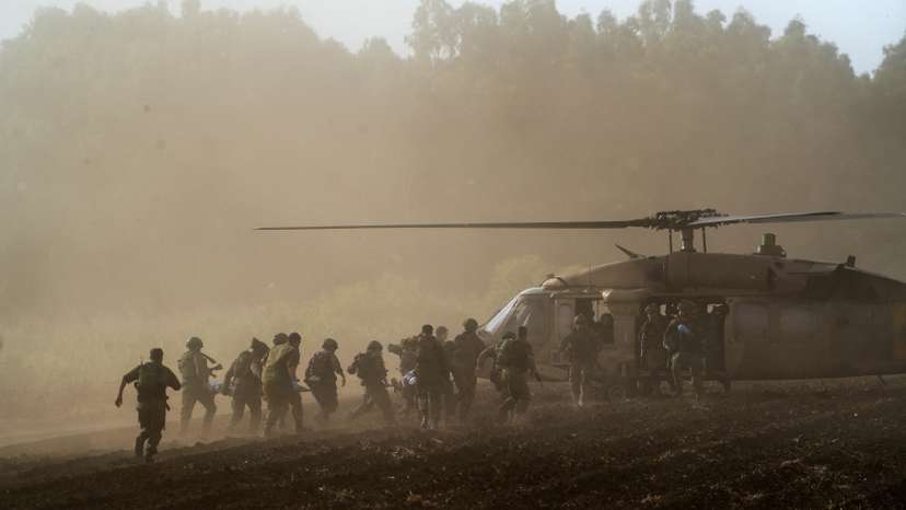 Israel's military evacuate injured people by helicopter after an anti-tank missile was fired into Israel from Lebanon, amid cross-border hostilities between Hezbollah and Israel, near Israel's border with Lebanon in northern Israel