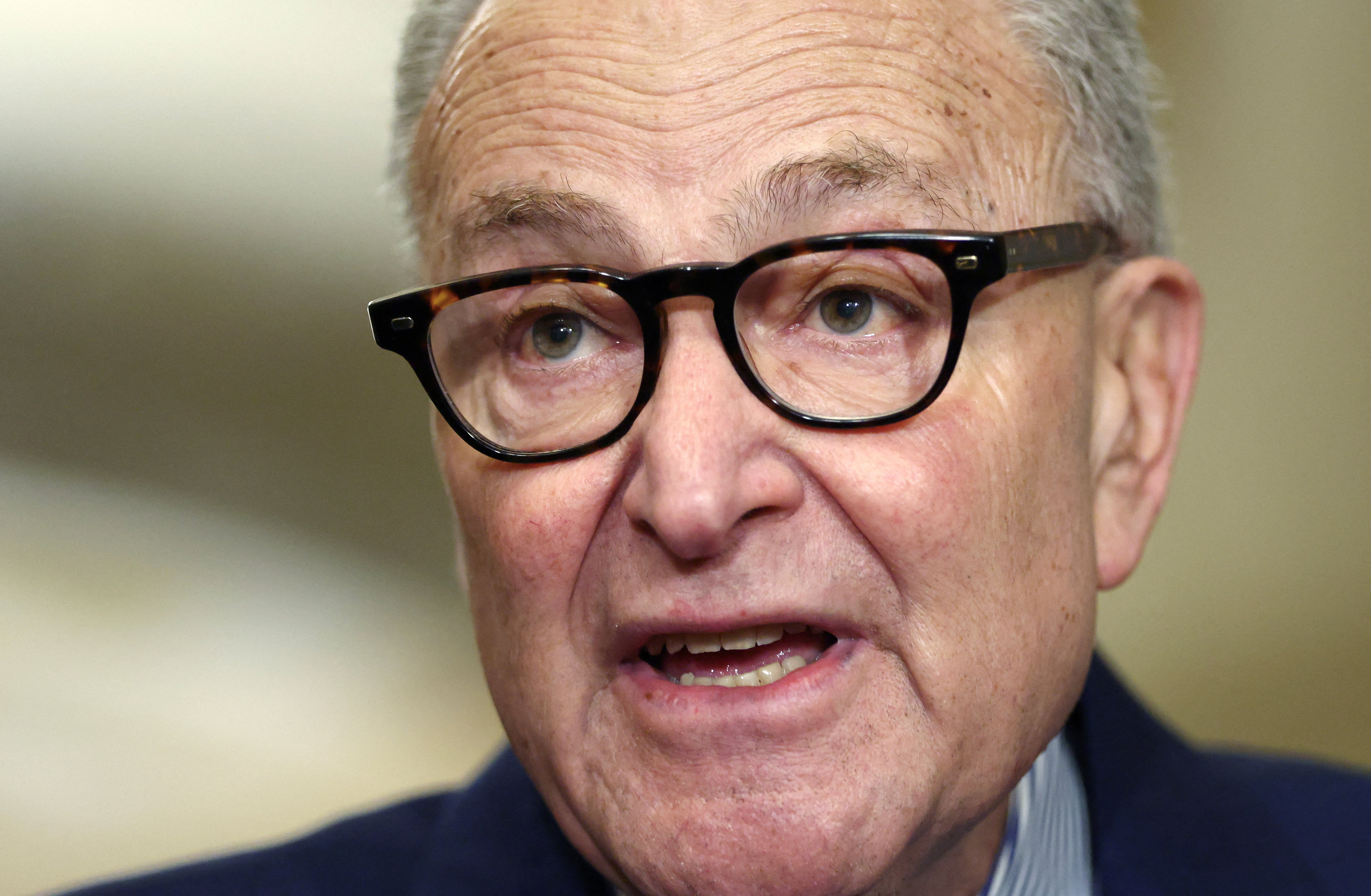 Schumer speaks to reporters at the Capitol in Washington