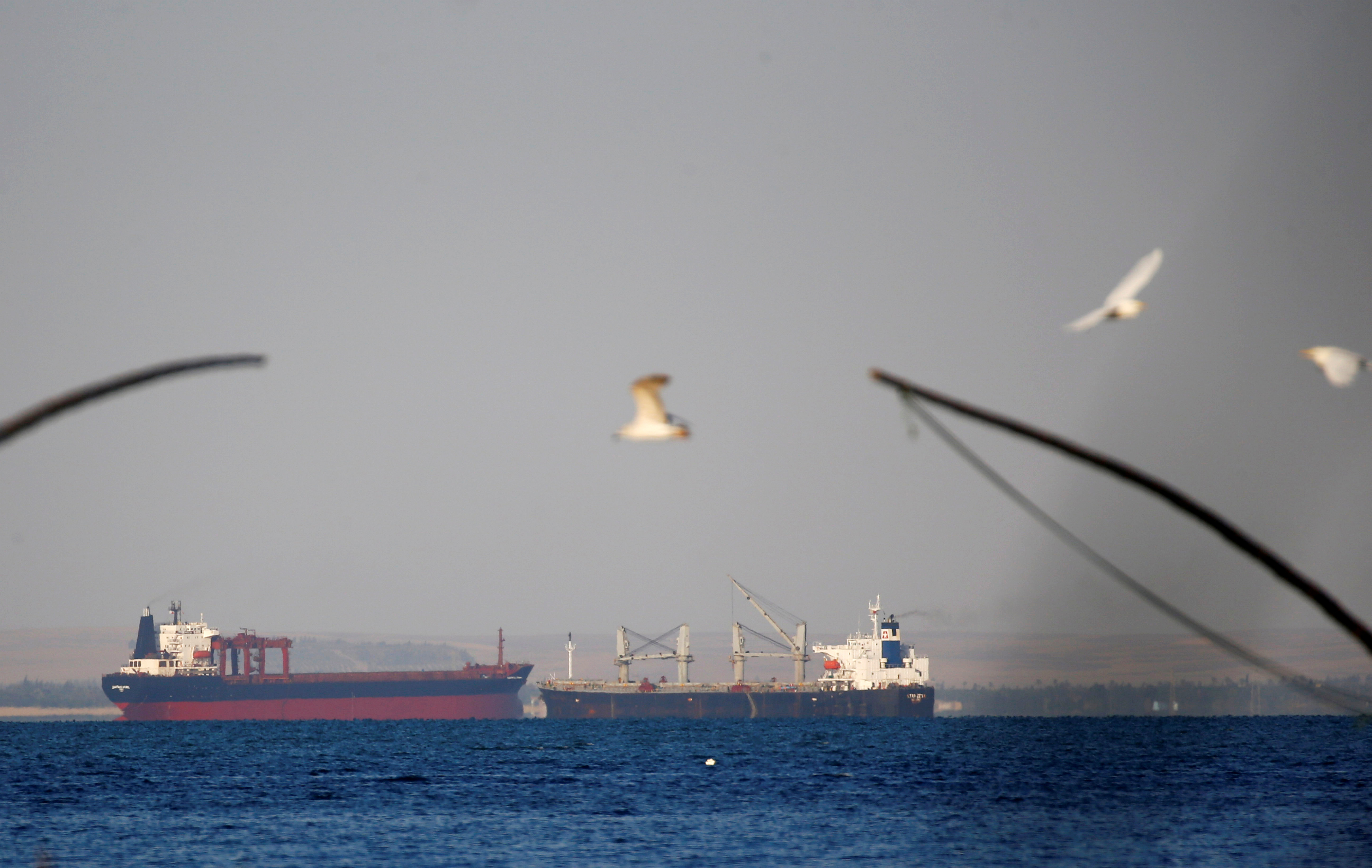 Container ships cross the Gulf of Suez towards the Red Sea before entering the Suez Canal, near Ismailia port city, northeast of Cairo