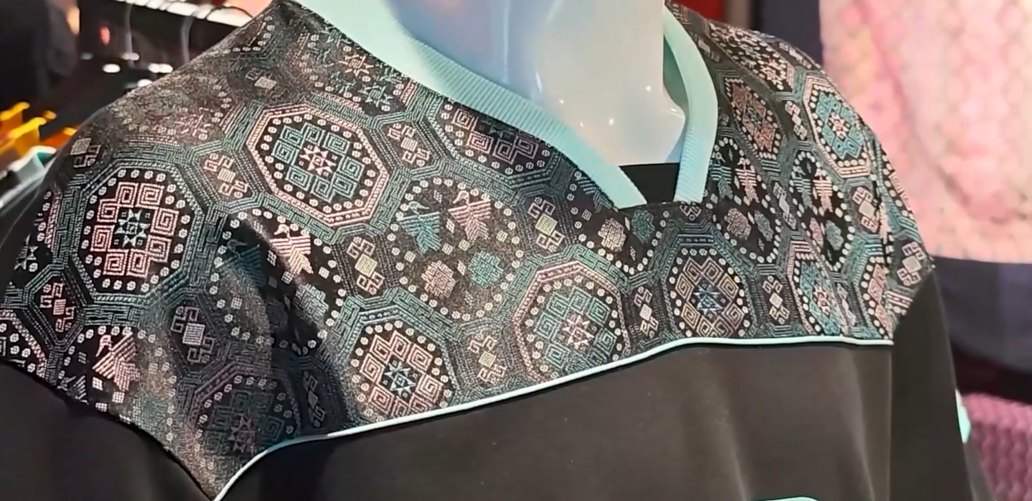 Chinese artist brings ancient Zhuang brocade to World Cup stage
