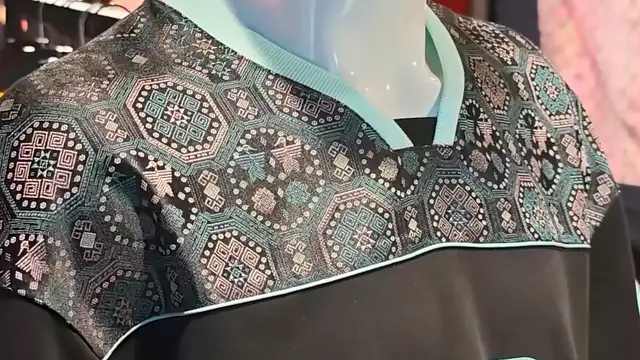 Chinese artist brings ancient Zhuang brocade to World Cup stage