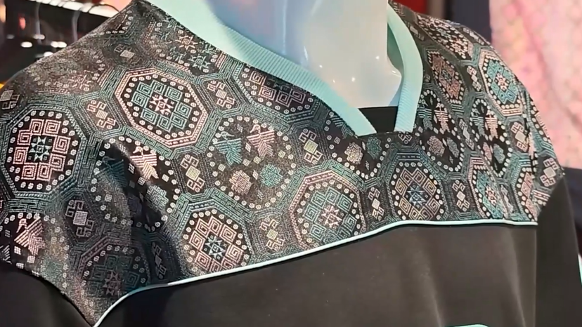 Chinese artist brings ancient Zhuang brocade to World Cup stage