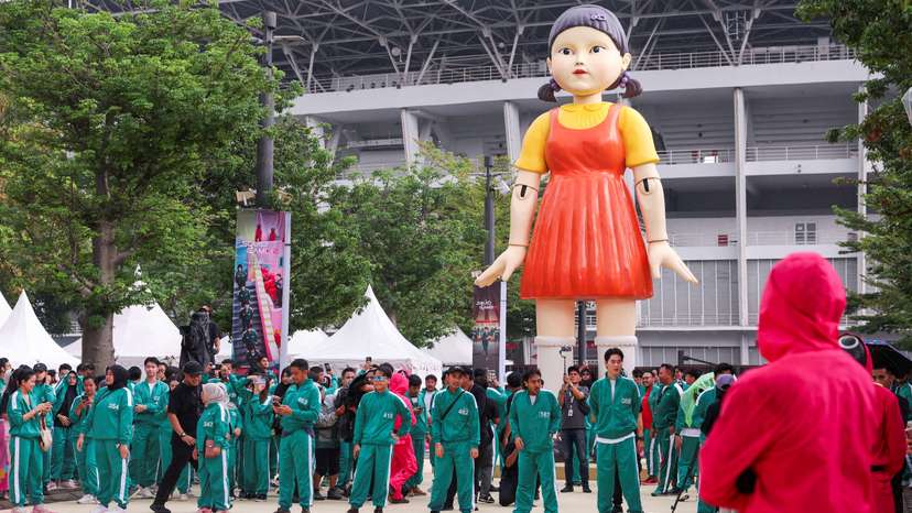 FILE PHOTO: Players take part in the Red Light, Green Light game at Gelora Bung Karno Stadium ahead of the release of the Netflix series Squid Game: Season 2 in Jakarta