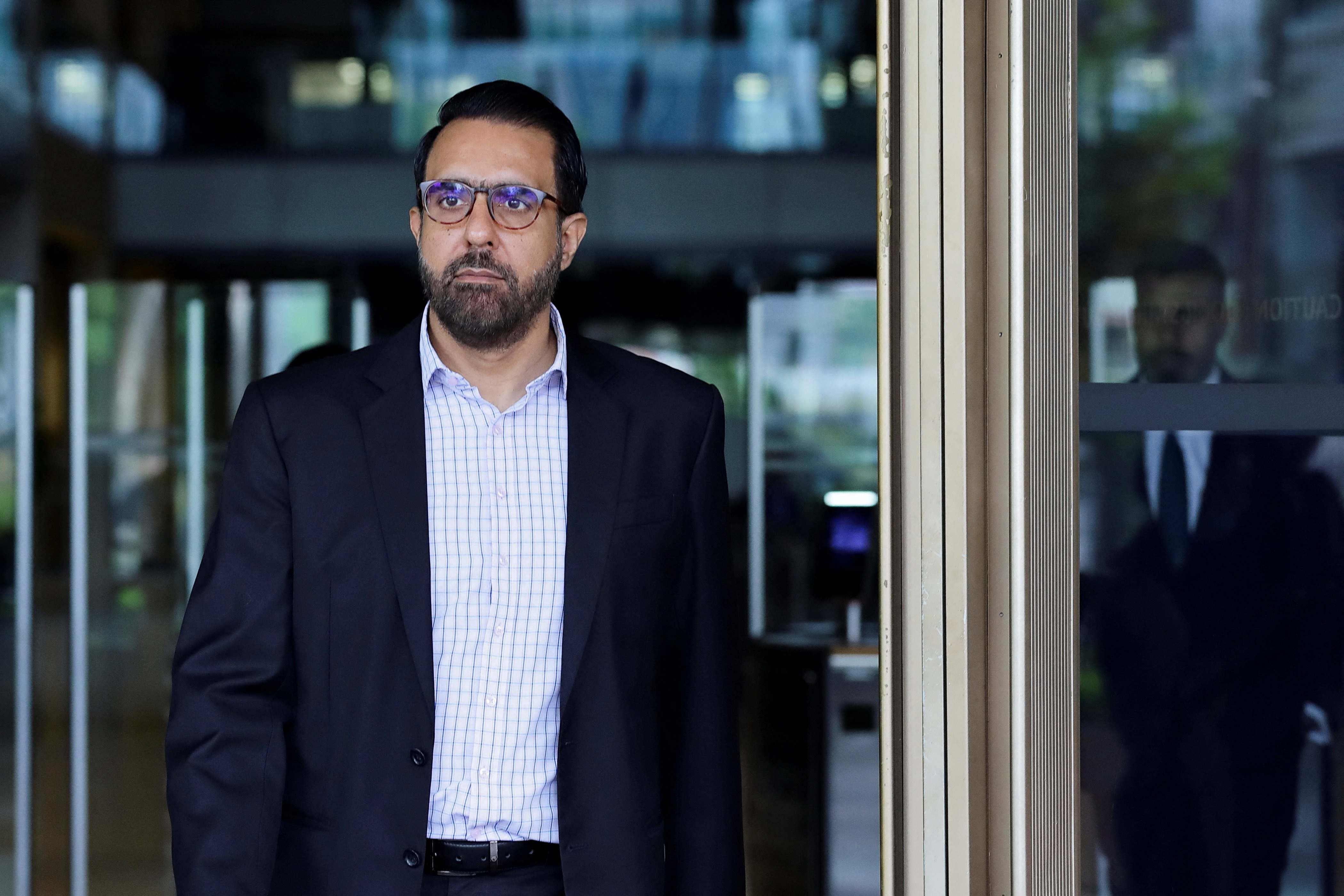 Leader of the Opposition Pritam Singh leaves the Supreme Court after his appeal was dismissed in Singapore