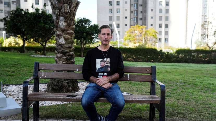 Ruby Chen, father of deceased U.S.-Israeli hostage Itay Chen, whose body is held by the Palestinian Islamist group Hamas in the Gaza Strip, sits on a park bench during an interview with Reuters in Netanya