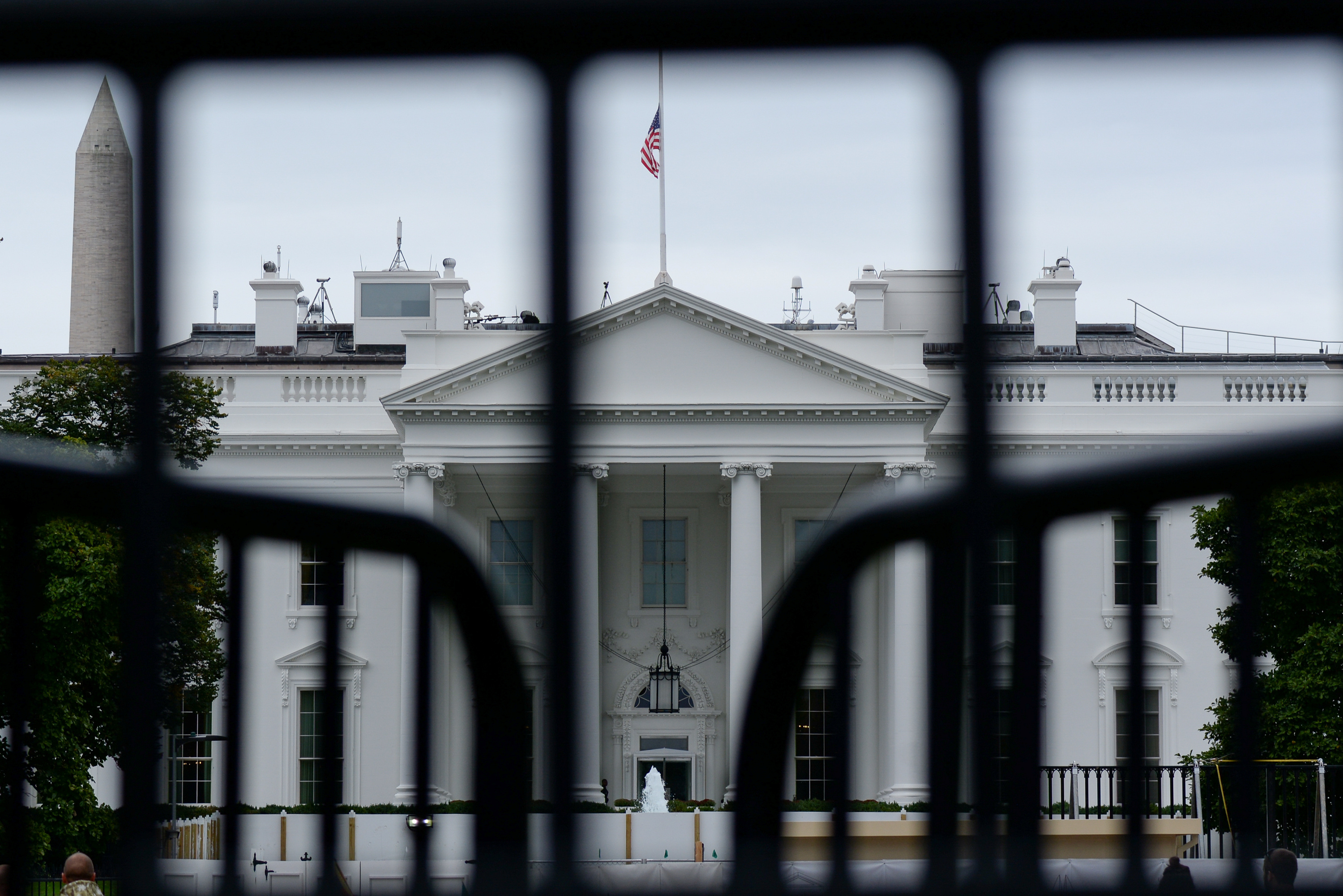 FILE PHOTO: The White House is seen through a metal gate in Washington