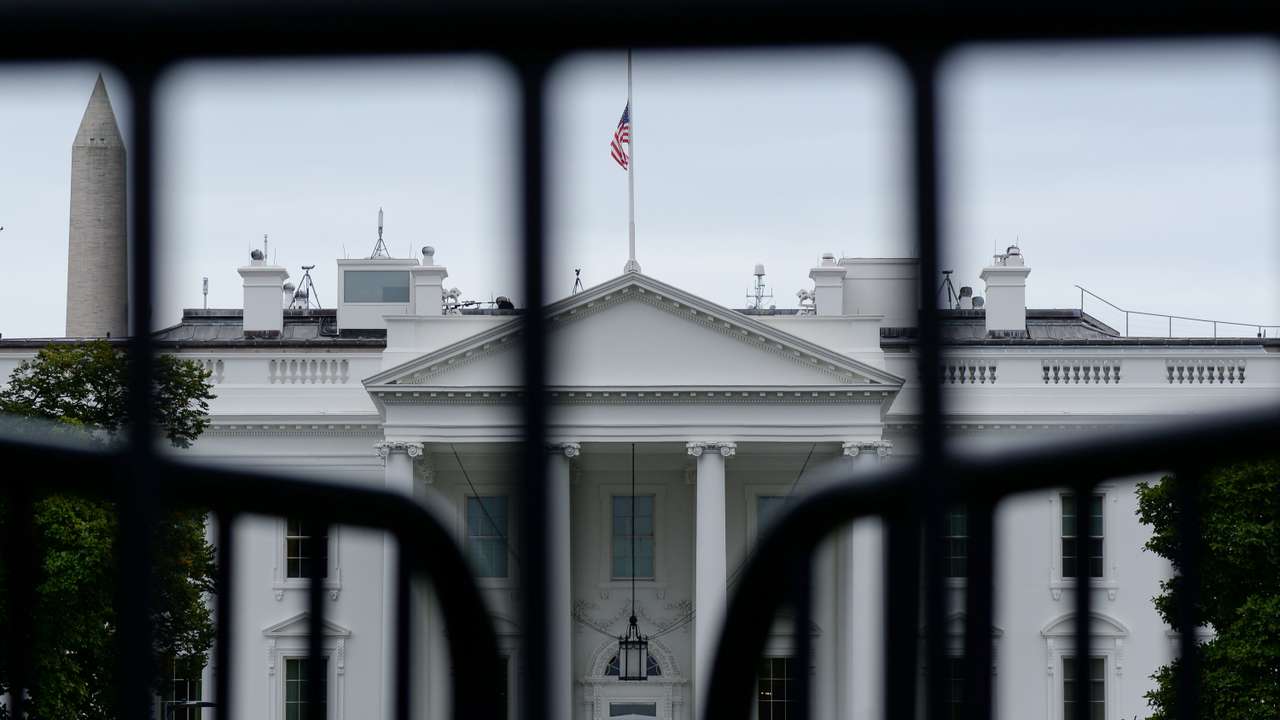 FILE PHOTO: The White House is seen through a metal gate in Washington