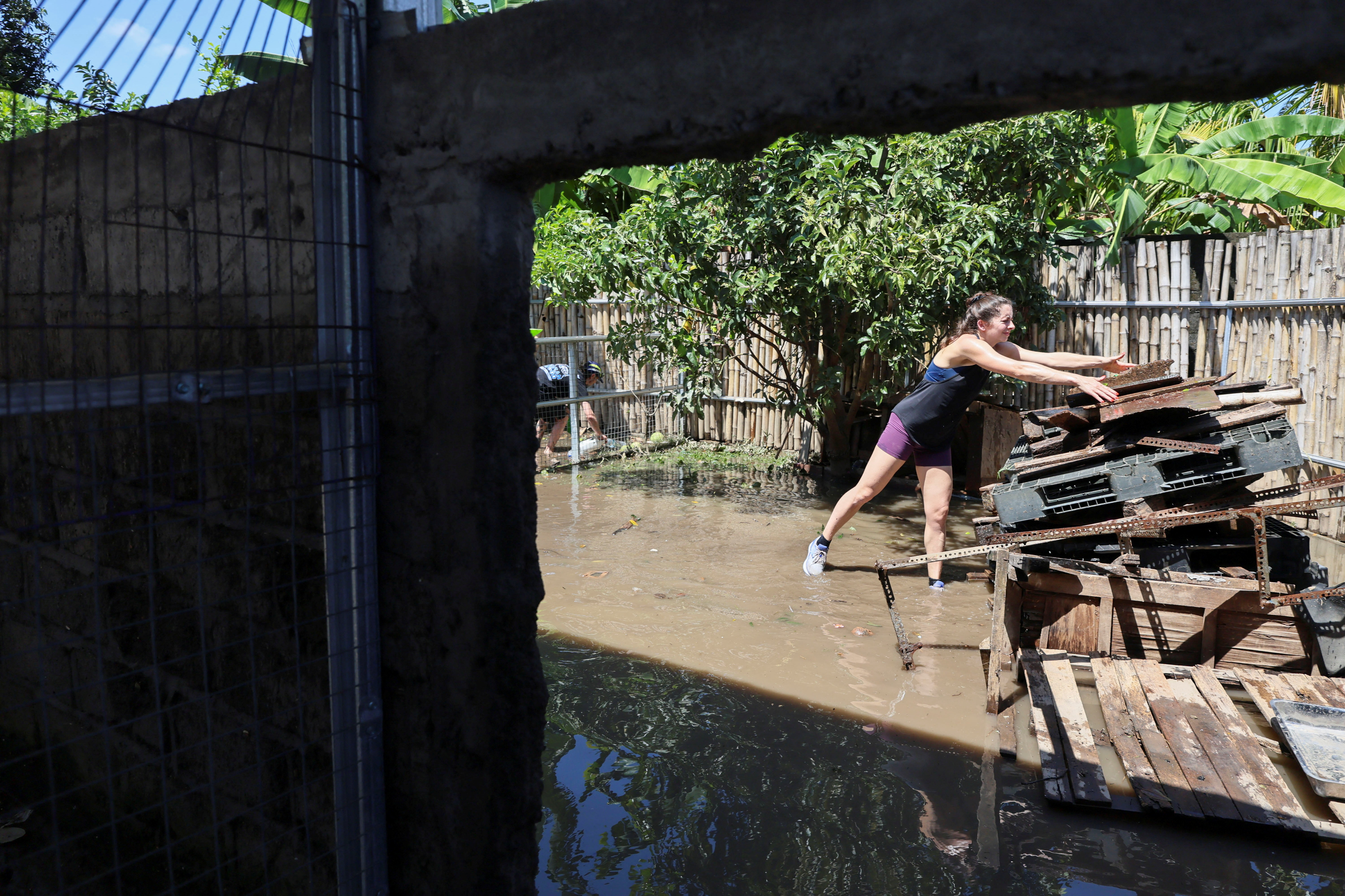 Flooded dog shelter in Bali