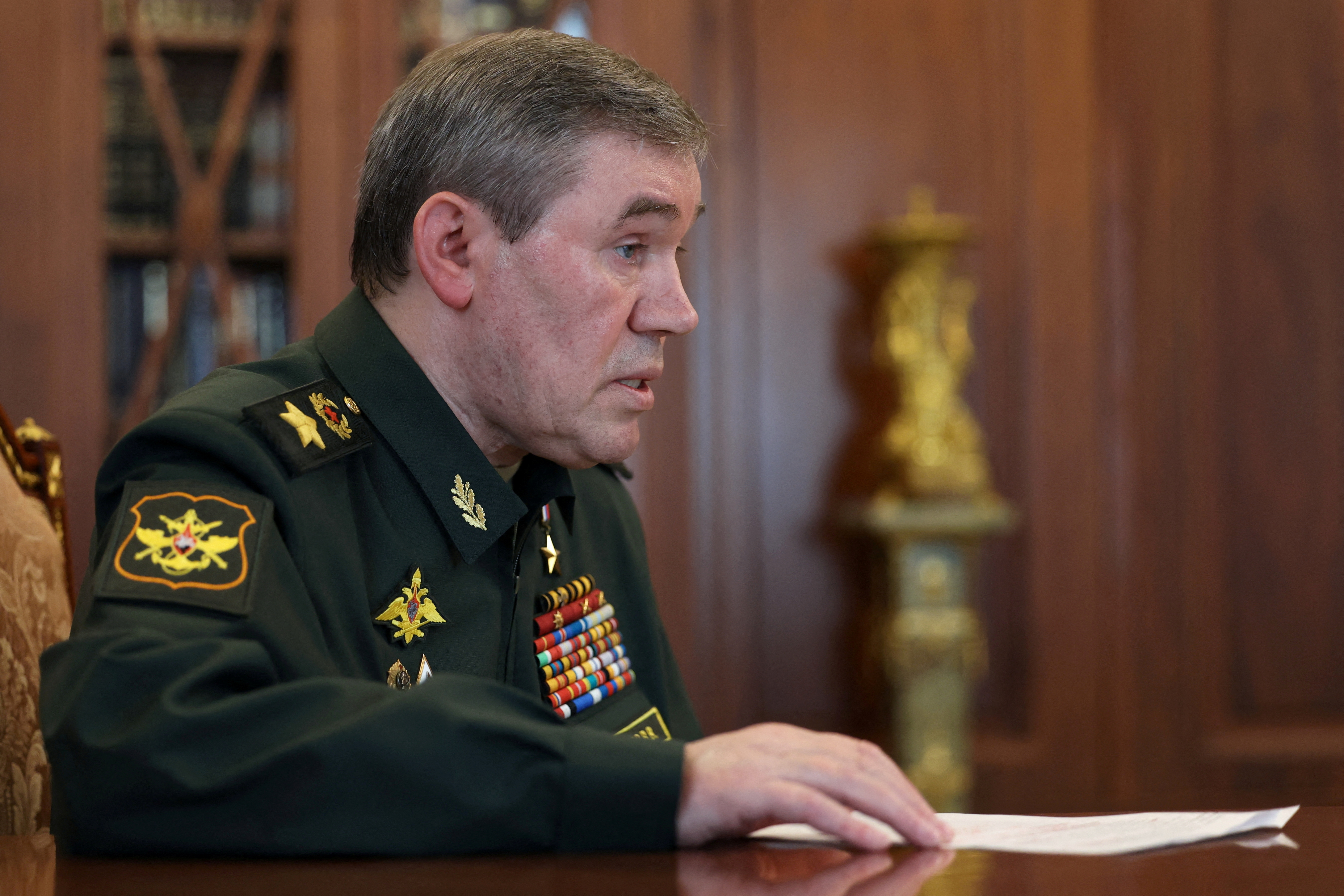 FILE PHOTO: Russian President Vladimir Putin meets with Chief of the General Staff Valery Gerasimov in Moscow