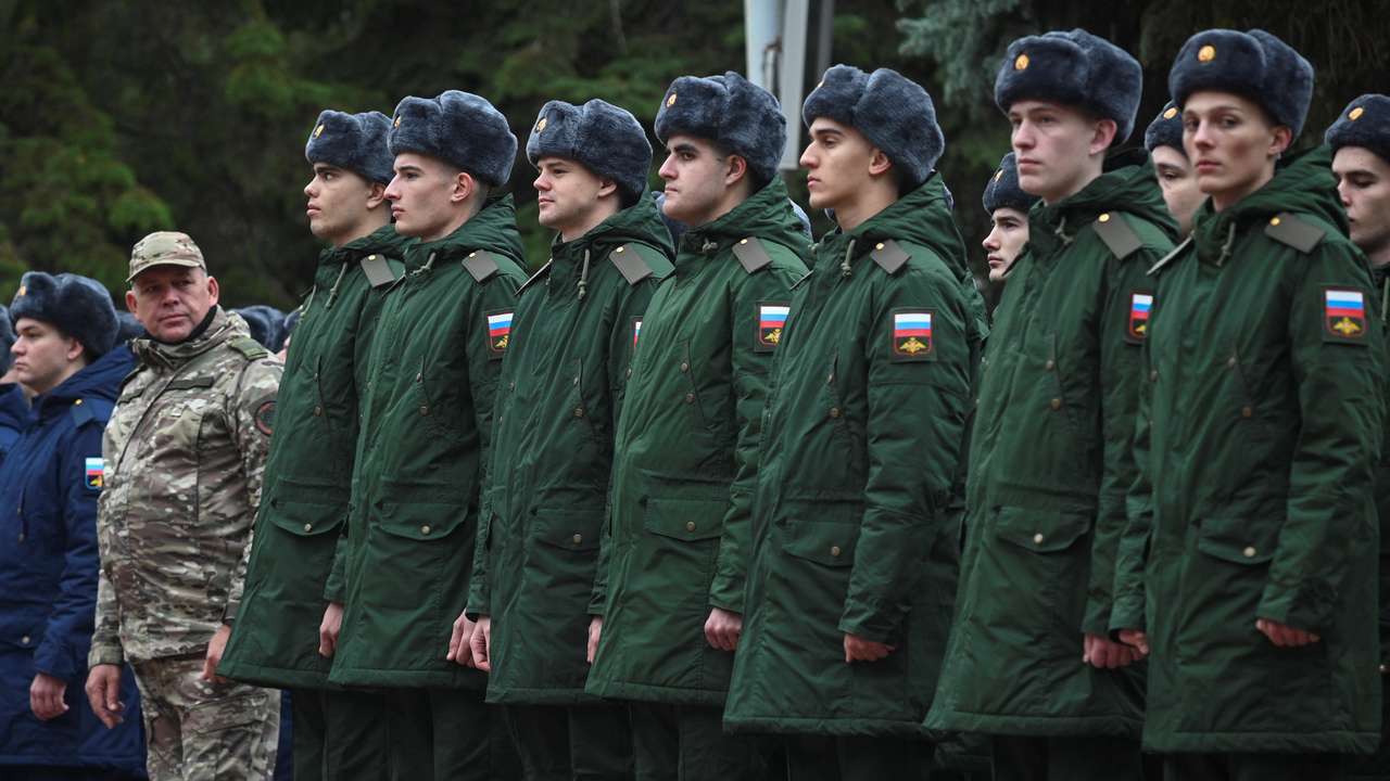 FILE PHOTO: Russian conscripts called up for military service depart for their garrisons, in Bataysk