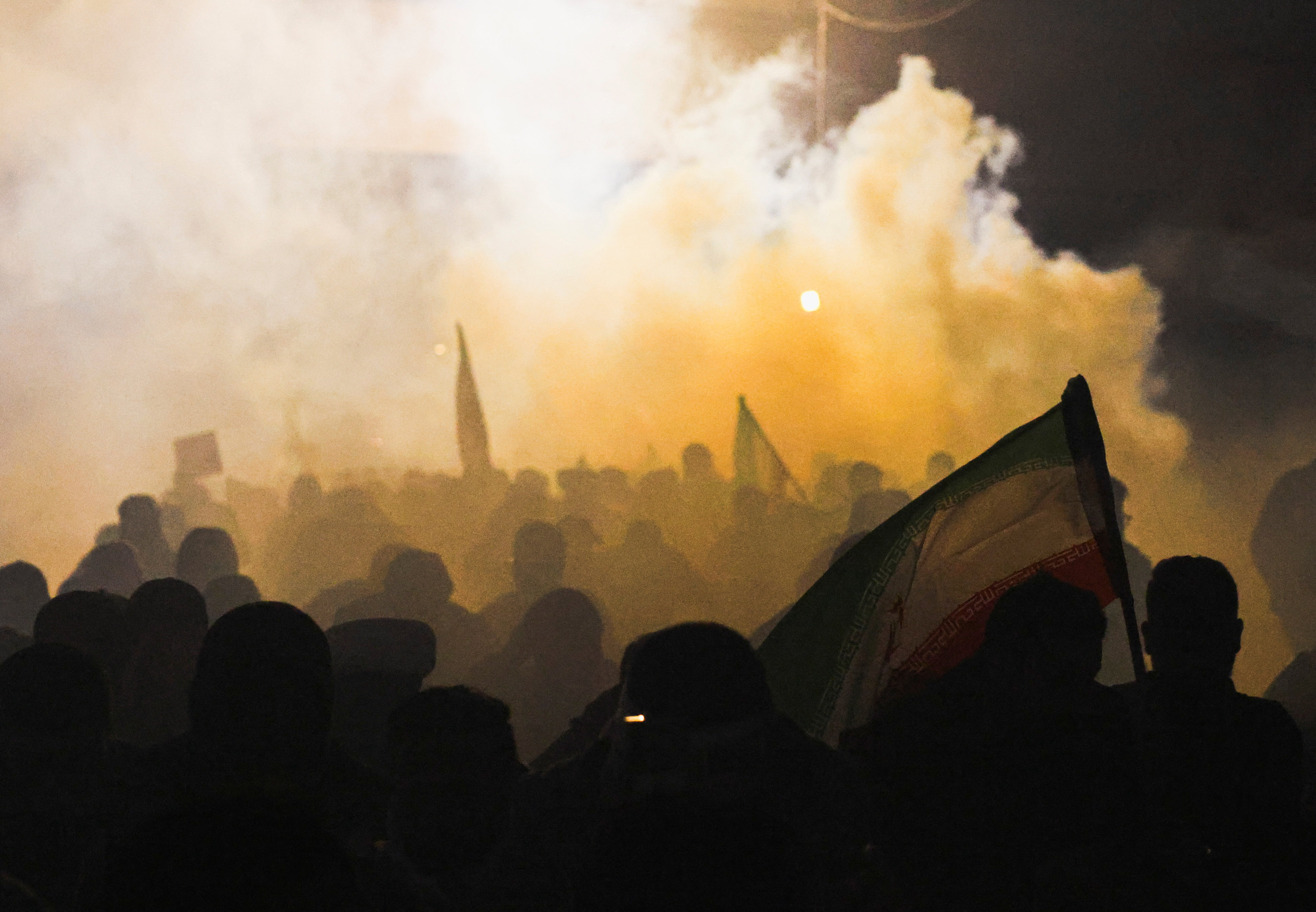 Supporters of Iraqi Shi'ite armed groups gather after the killing of Iran's Supreme Leader Ayatollah Ali Khamenei, in Baghdad
