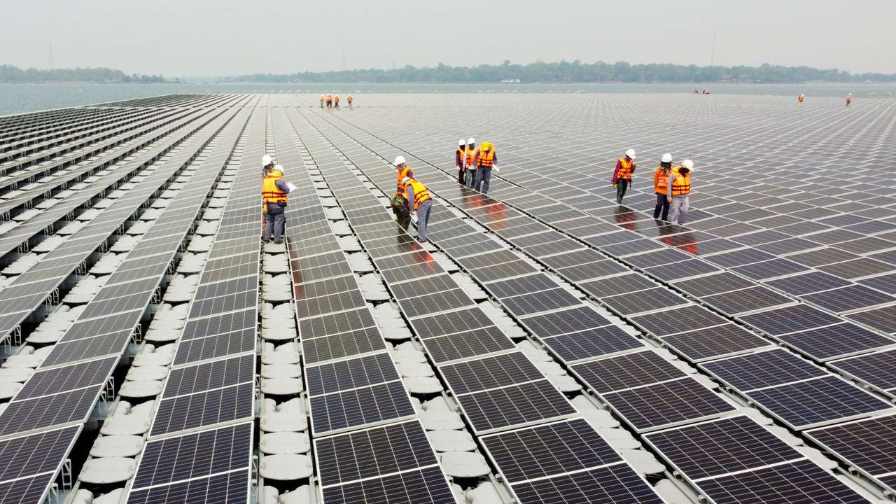 FILE PHOTO: Solar panels over the water surface of Sirindhorn Dam in Ubon Ratchathani