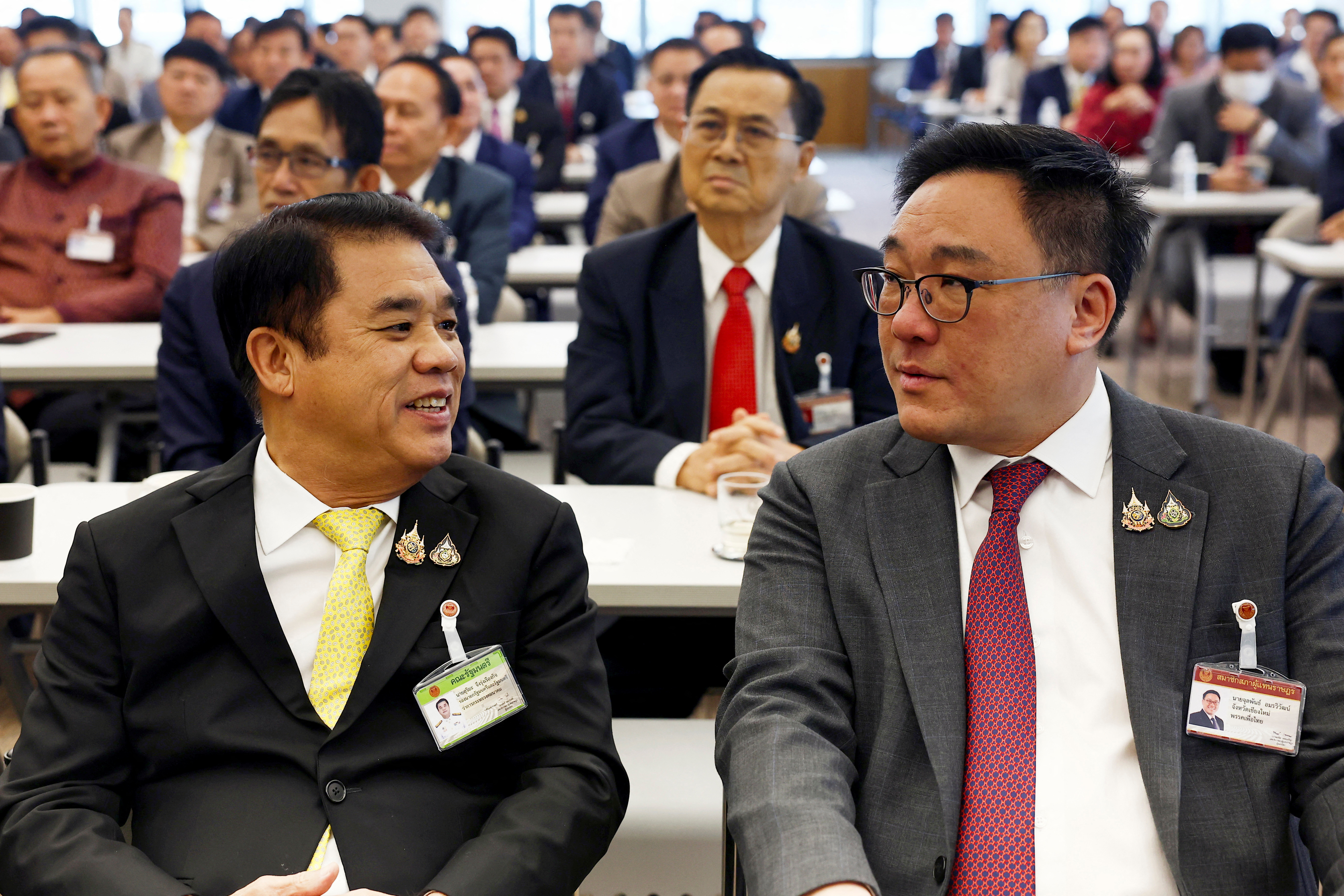 Pheu Thai Party members attend a meeting at the parliament house to select its PM candidate, ahead of a pivotal parliamentary vote on the new PM, in Bangkok